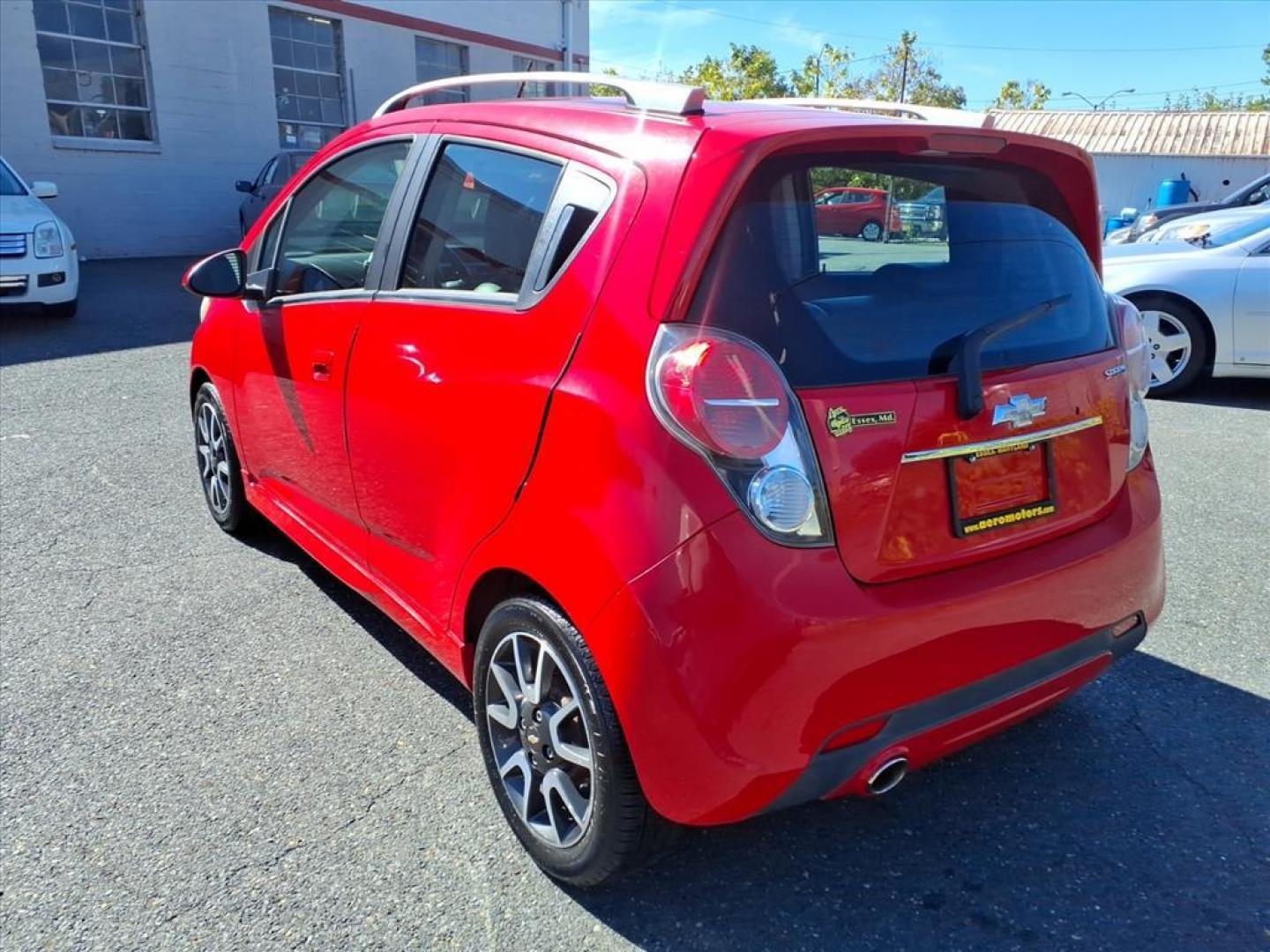 2013 Salsa Chevrolet Spark 2LT Auto (KL8CF6S91DC) with an 1.2L Ecotec 1.2L I4 84hp 83ft. lbs. Fuel Injected engine, 4-Speed Automatic transmission, located at 50 Eastern Blvd., Essex, MD, 21221, (410) 686-3444, 39.304367, -76.484947 - Photo#2