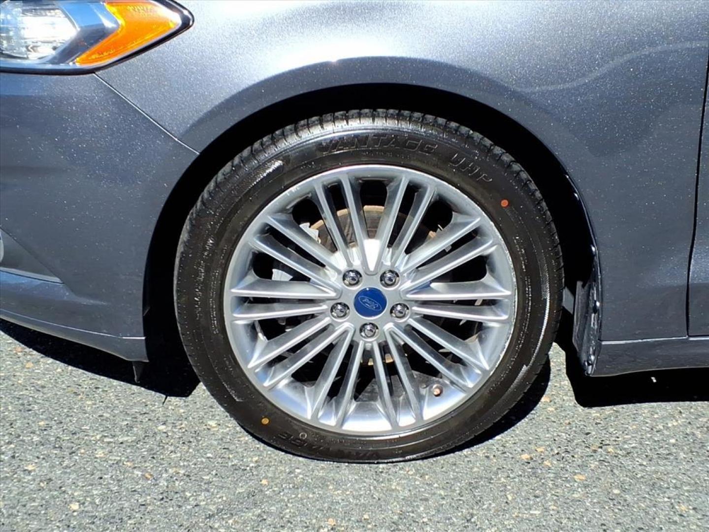2015 Magnetic Metallic Ford Fusion SE (3FA6P0H91FR) with an 2.0L EcoBoost 2.0L Turbo I4 240hp 270ft. lbs. Turbocharged engine, 6-Speed Shiftable Automatic transmission, located at 50 Eastern Blvd., Essex, MD, 21221, (410) 686-3444, 39.304367, -76.484947 - Photo#8
