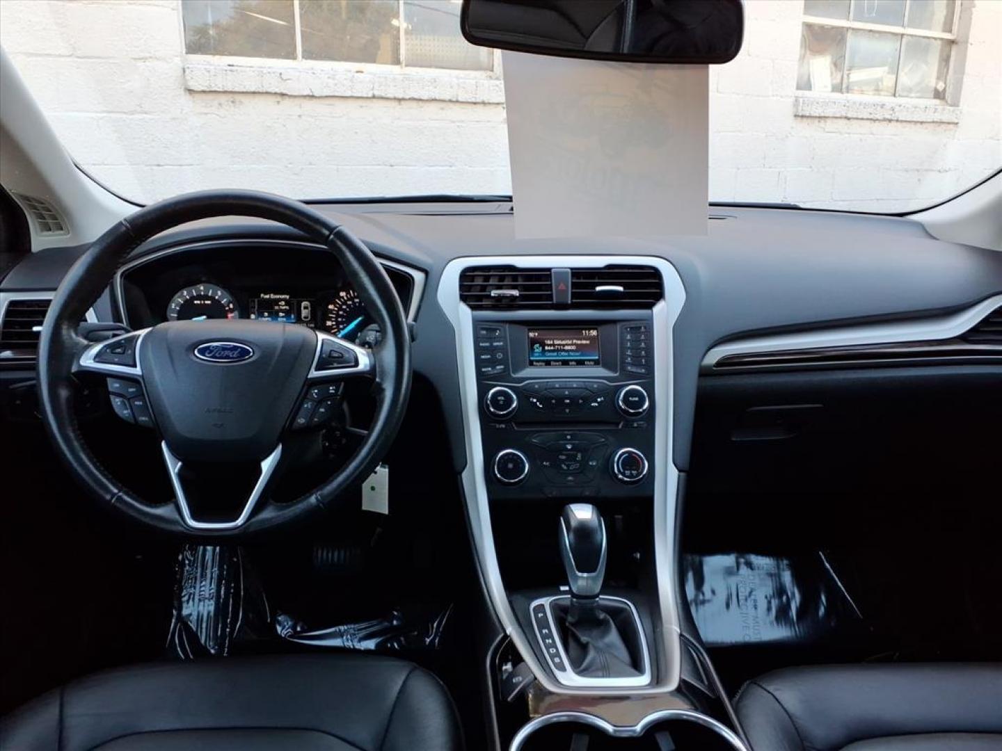 2015 Magnetic Metallic Ford Fusion SE (3FA6P0H91FR) with an 2.0L EcoBoost 2.0L Turbo I4 240hp 270ft. lbs. Turbocharged engine, 6-Speed Shiftable Automatic transmission, located at 50 Eastern Blvd., Essex, MD, 21221, (410) 686-3444, 39.304367, -76.484947 - Photo#14