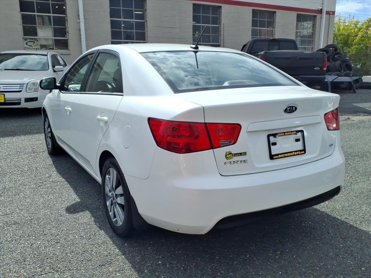 2013 Snow White Pearl Kia Forte EX (KNAFU4A29D5) with an 2.0L 2.0L I4 156hp 144ft. lbs. Sequential-Port F.I. engine, 6-Speed Shiftable Automatic transmission, located at 50 Eastern Blvd., Essex, MD, 21221, (410) 686-3444, 39.304367, -76.484947 - Photo#2