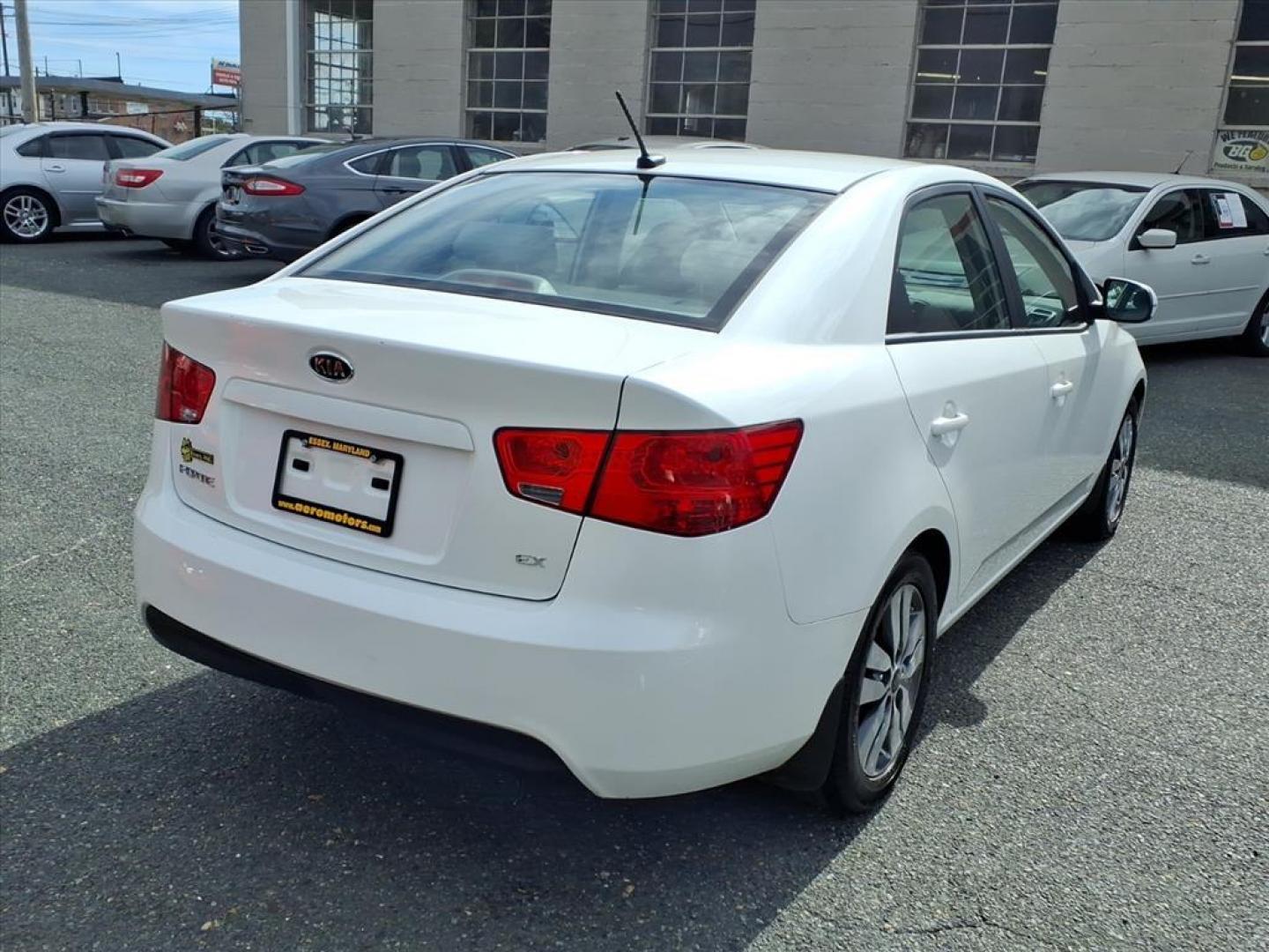 2013 Snow White Pearl Kia Forte EX (KNAFU4A29D5) with an 2.0L 2.0L I4 156hp 144ft. lbs. Sequential-Port F.I. engine, 6-Speed Shiftable Automatic transmission, located at 50 Eastern Blvd., Essex, MD, 21221, (410) 686-3444, 39.304367, -76.484947 - Photo#4