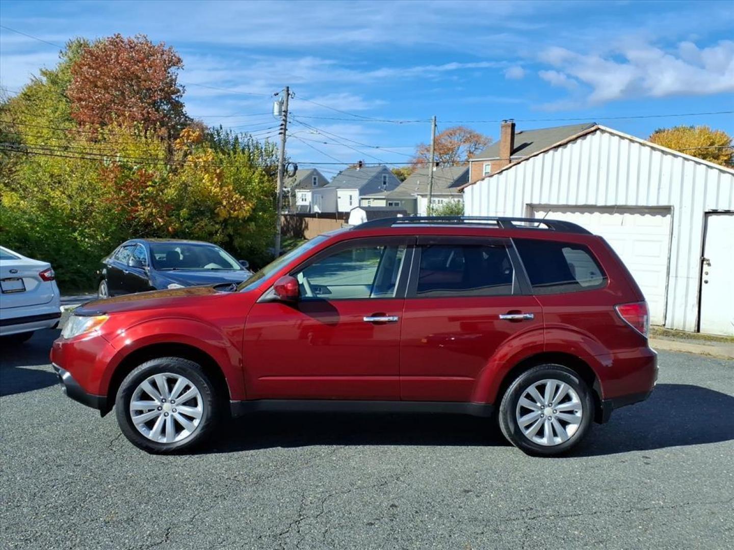 2012 Camellia Red Pearl Subaru Forester 2.5X Limited (JF2SHAECXCH) with an 2.5L 2.5L H4 170hp 174ft. lbs. Fuel Injected engine, 4-Speed Shiftable Automatic transmission, located at 50 Eastern Blvd., Essex, MD, 21221, (410) 686-3444, 39.304367, -76.484947 - Photo#1