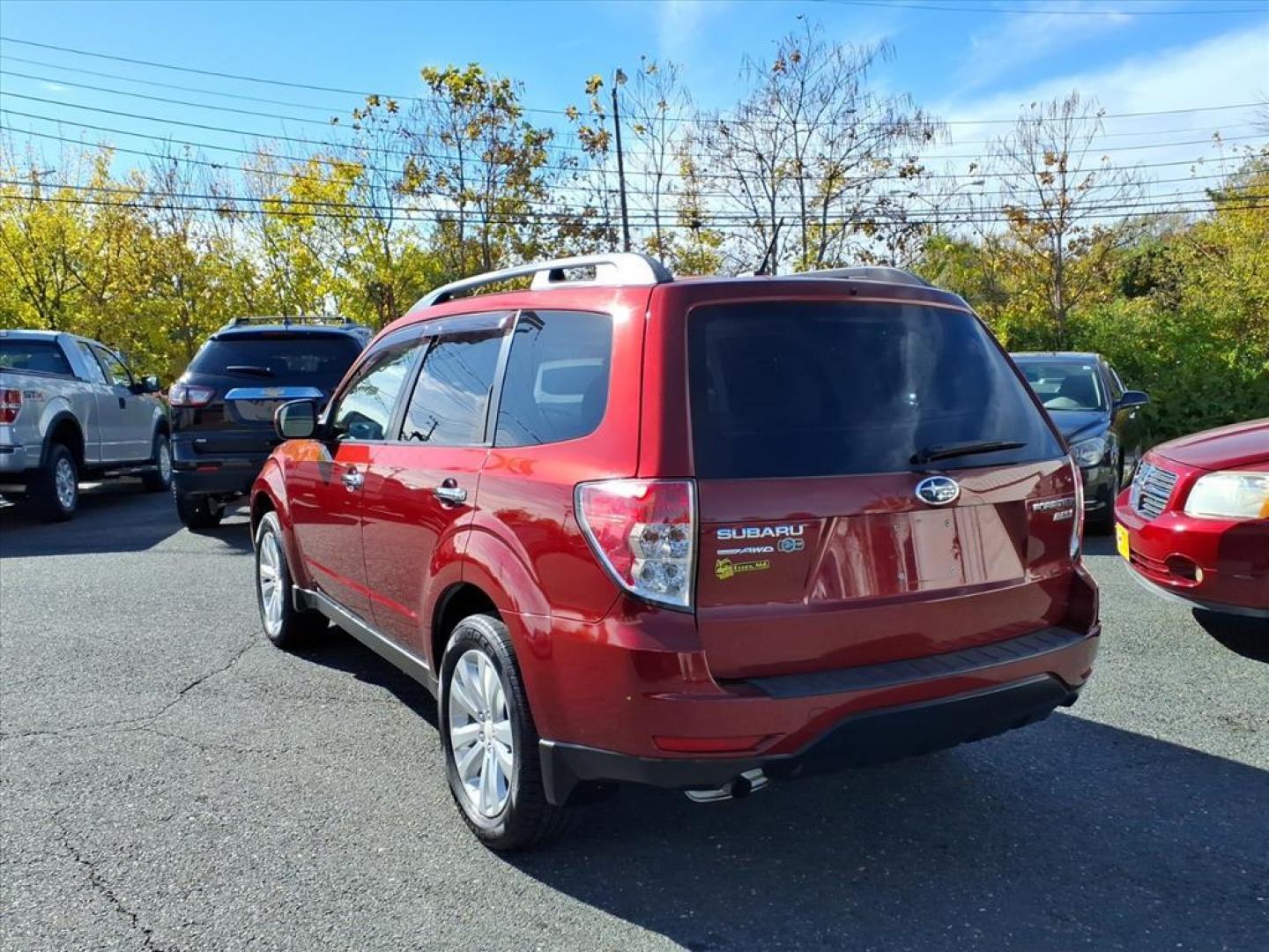 2012 Camellia Red Pearl Subaru Forester 2.5X Limited (JF2SHAECXCH) with an 2.5L 2.5L H4 170hp 174ft. lbs. Fuel Injected engine, 4-Speed Shiftable Automatic transmission, located at 50 Eastern Blvd., Essex, MD, 21221, (410) 686-3444, 39.304367, -76.484947 - Photo#2