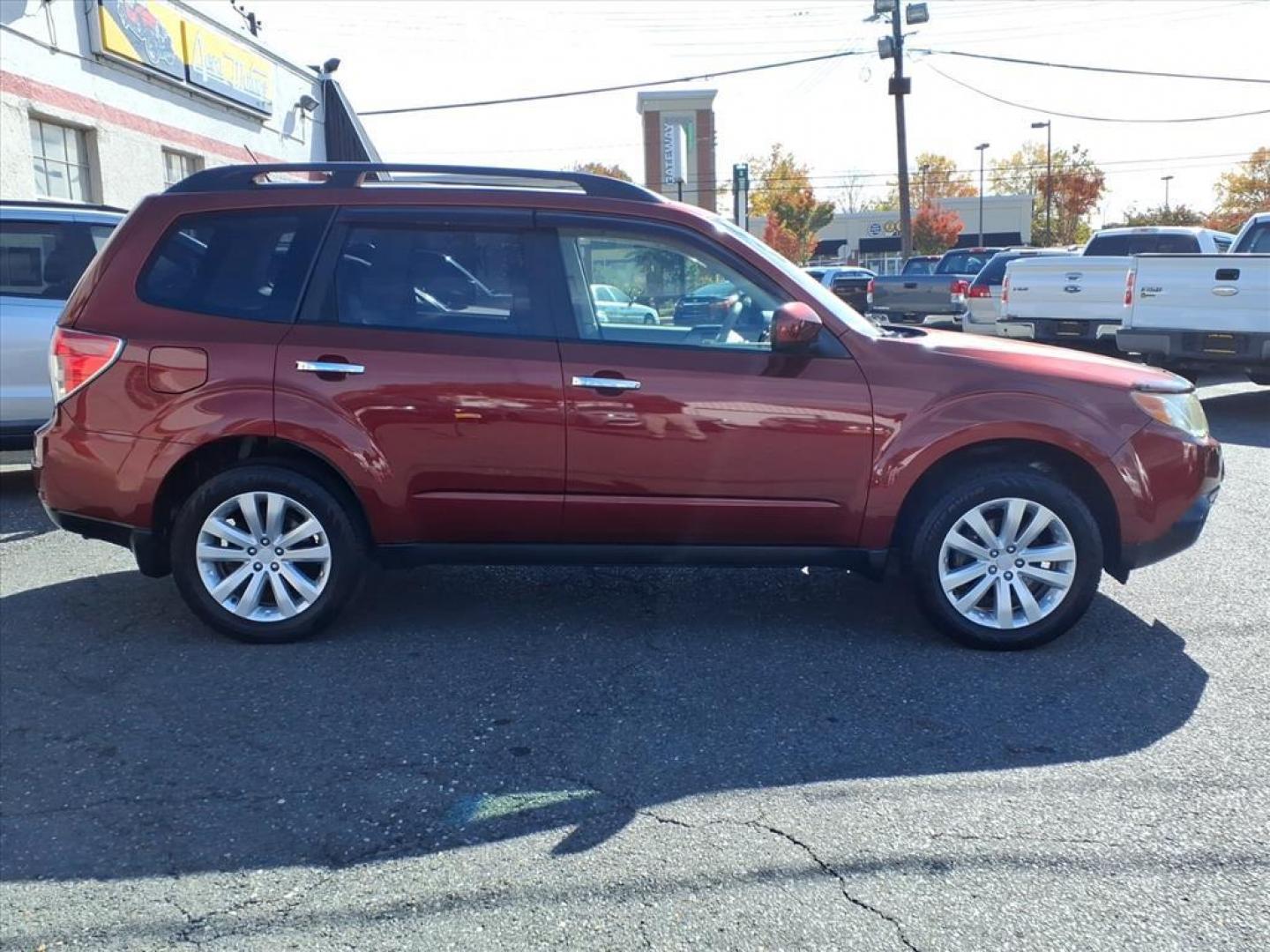 2012 Camellia Red Pearl Subaru Forester 2.5X Limited (JF2SHAECXCH) with an 2.5L 2.5L H4 170hp 174ft. lbs. Fuel Injected engine, 4-Speed Shiftable Automatic transmission, located at 50 Eastern Blvd., Essex, MD, 21221, (410) 686-3444, 39.304367, -76.484947 - Photo#5