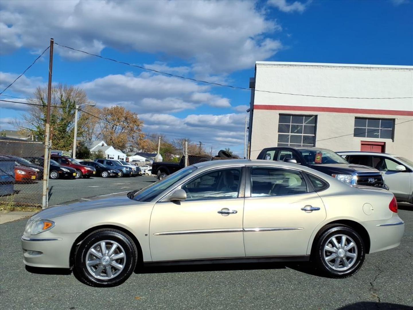 2009 Gold Mist Metallic Buick LaCrosse CX (2G4WC582691) with an 3.8L 6 Cylinder Sequential-Port F.I. engine, V6 AT transmission, located at 50 Eastern Blvd., Essex, MD, 21221, (410) 686-3444, 39.304367, -76.484947 - Photo#1