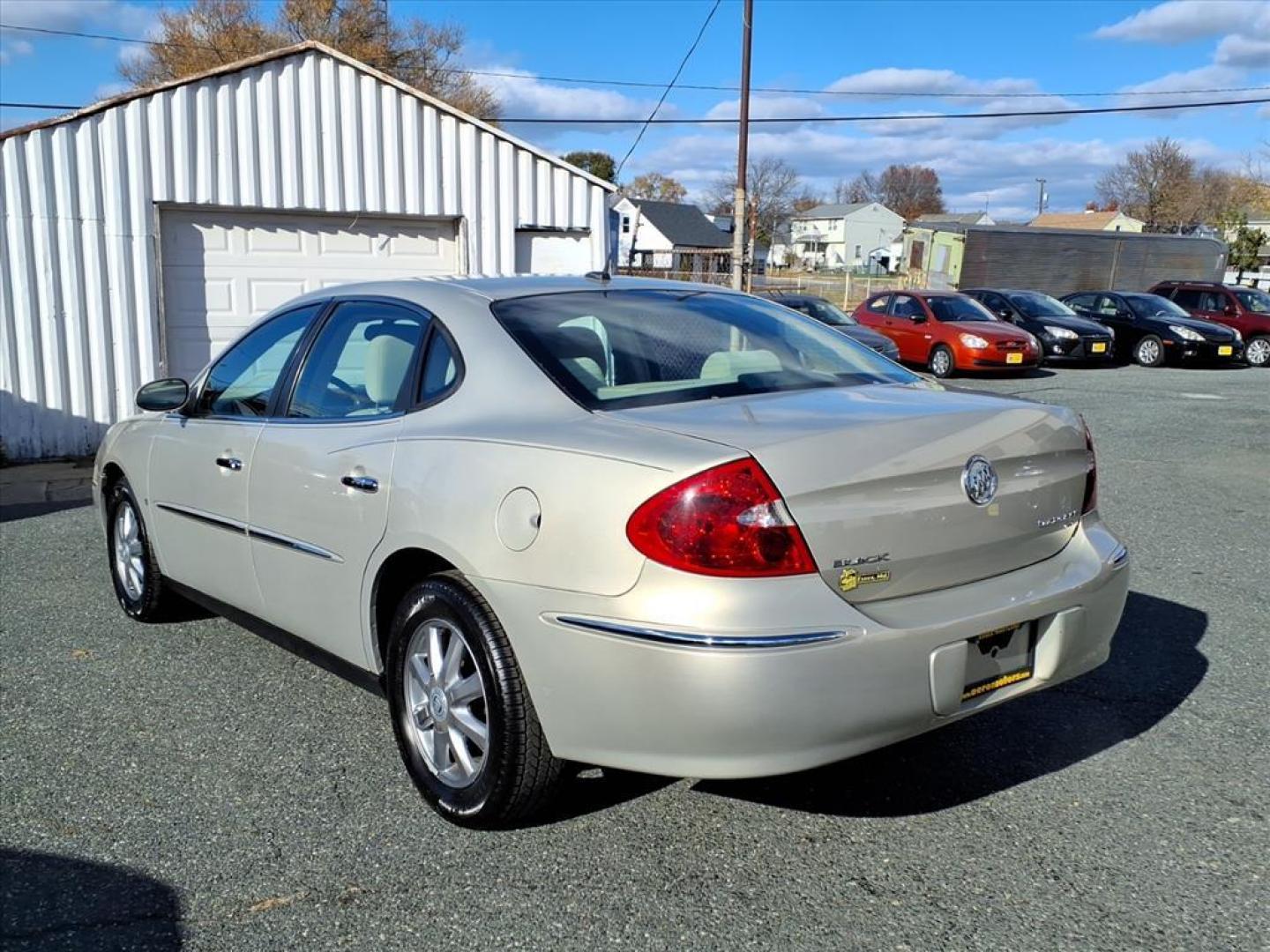 2009 Gold Mist Metallic Buick LaCrosse CX (2G4WC582691) with an 3.8L 6 Cylinder Sequential-Port F.I. engine, V6 AT transmission, located at 50 Eastern Blvd., Essex, MD, 21221, (410) 686-3444, 39.304367, -76.484947 - Photo#2