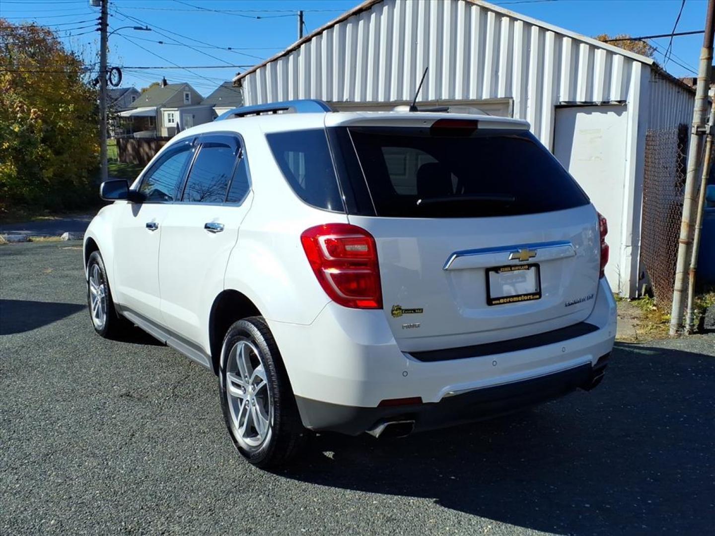 2016 Summit White Chevrolet Equinox LTZ (2GNFLGE30G6) with an 3.6L 3.6L V6 301hp 272ft. lbs. Fuel Injected engine, 6-Speed Shiftable Automatic transmission, located at 50 Eastern Blvd., Essex, MD, 21221, (410) 686-3444, 39.304367, -76.484947 - Photo#2