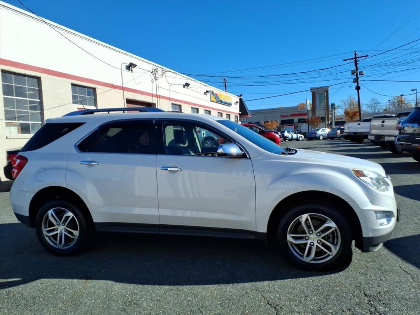 2016 Summit White Chevrolet Equinox LTZ (2GNFLGE30G6) with an 3.6L 3.6L V6 301hp 272ft. lbs. Fuel Injected engine, 6-Speed Shiftable Automatic transmission, located at 50 Eastern Blvd., Essex, MD, 21221, (410) 686-3444, 39.304367, -76.484947 - Photo#6