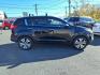 2013 Black Kia Sportage EX (KNDPCCA22D7) with an 2.4L 2.4L I4 176hp 168ft. lbs. Sequential-Port F.I. engine, 6-Speed Automatic Sportmatic transmission, located at 50 Eastern Blvd., Essex, MD, 21221, (410) 686-3444, 39.304367, -76.484947 - Photo#5