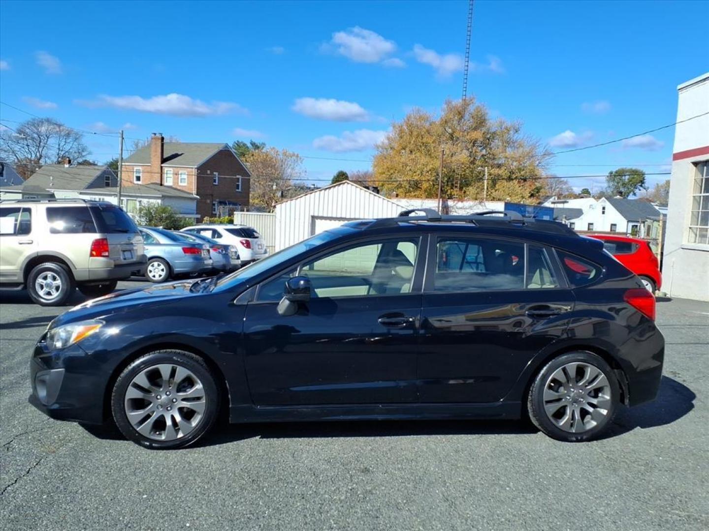 2014 Crystal Black Silica Subaru Impreza 2.0i Sport Limited (JF1GPAS62E8) with an 2.0L 2.0L H4 148hp 145ft. lbs. Sequential-Port F.I. engine, CVT transmission, located at 50 Eastern Blvd., Essex, MD, 21221, (410) 686-3444, 39.304367, -76.484947 - Photo#1