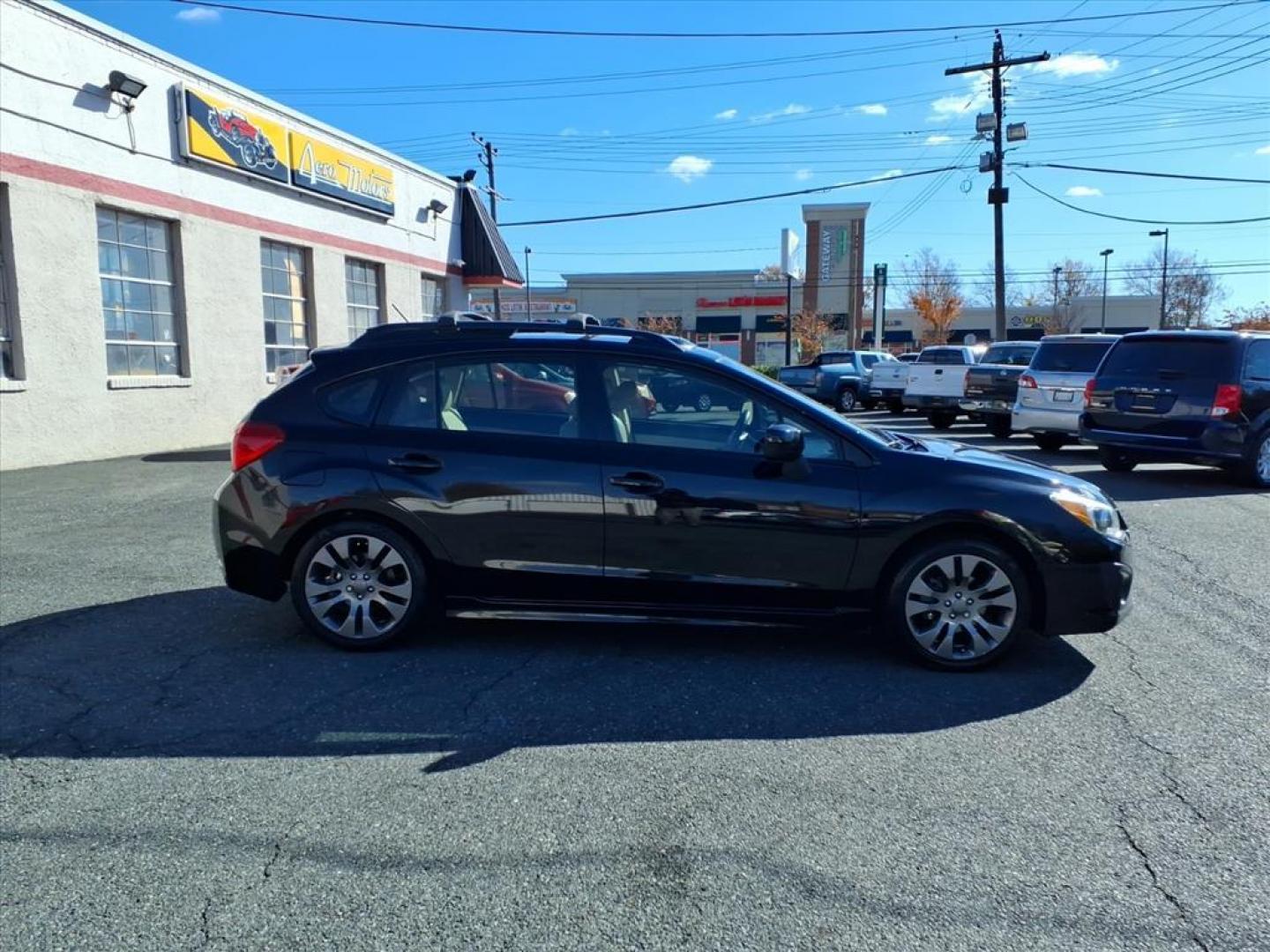 2014 Crystal Black Silica Subaru Impreza 2.0i Sport Limited (JF1GPAS62E8) with an 2.0L 2.0L H4 148hp 145ft. lbs. Sequential-Port F.I. engine, CVT transmission, located at 50 Eastern Blvd., Essex, MD, 21221, (410) 686-3444, 39.304367, -76.484947 - Photo#6