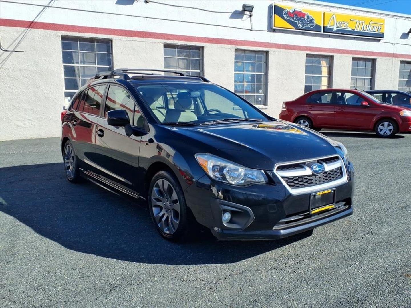 2014 Crystal Black Silica Subaru Impreza 2.0i Sport Limited (JF1GPAS62E8) with an 2.0L 2.0L H4 148hp 145ft. lbs. Sequential-Port F.I. engine, CVT transmission, located at 50 Eastern Blvd., Essex, MD, 21221, (410) 686-3444, 39.304367, -76.484947 - Photo#7