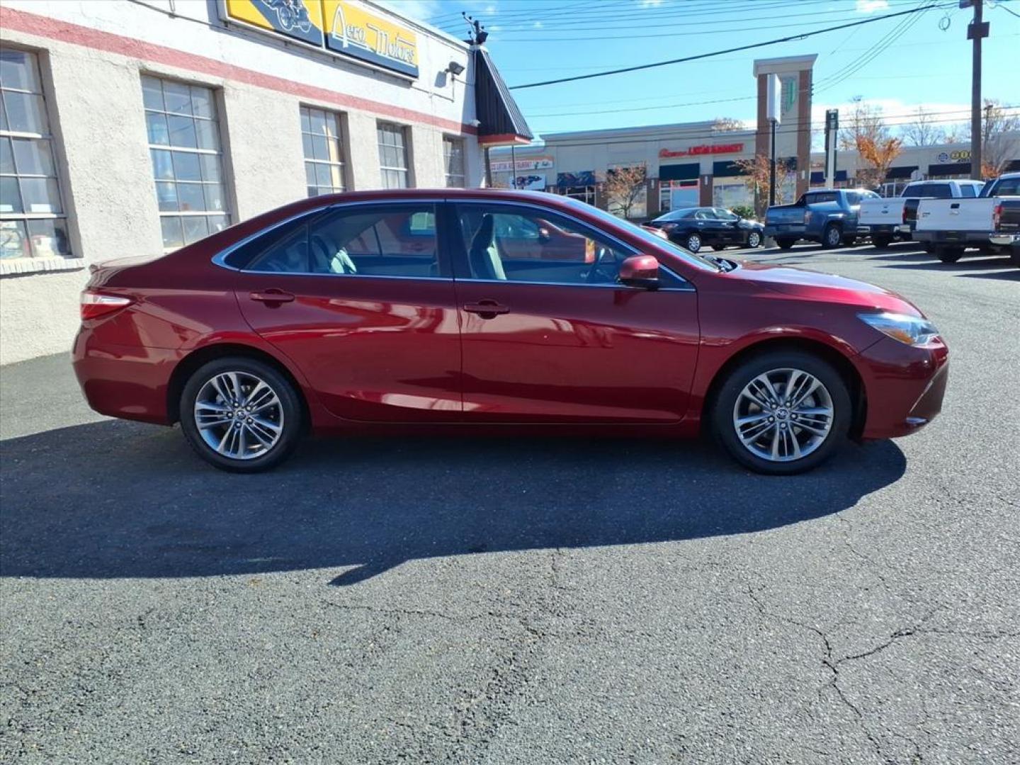 2015 Ruby Flare Pearl Toyota Camry SE (4T1BF1FK0FU) with an 2.5L 2.5L I4 178hp 170ft. lbs. Sequential-Port F.I. engine, 6-Speed Shiftable Automatic transmission, located at 50 Eastern Blvd., Essex, MD, 21221, (410) 686-3444, 39.304367, -76.484947 - Photo#4