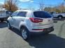 2013 Bright Silver Kia Sportage LX (KNDPBCA24D7) with an 2.4L 2.4L I4 176hp 168ft. lbs. Sequential-Port F.I. engine, 6-Speed Automatic Sportmatic transmission, located at 50 Eastern Blvd., Essex, MD, 21221, (410) 686-3444, 39.304367, -76.484947 - Photo#2