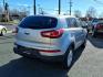 2013 Bright Silver Kia Sportage LX (KNDPBCA24D7) with an 2.4L 2.4L I4 176hp 168ft. lbs. Sequential-Port F.I. engine, 6-Speed Automatic Sportmatic transmission, located at 50 Eastern Blvd., Essex, MD, 21221, (410) 686-3444, 39.304367, -76.484947 - Photo#5