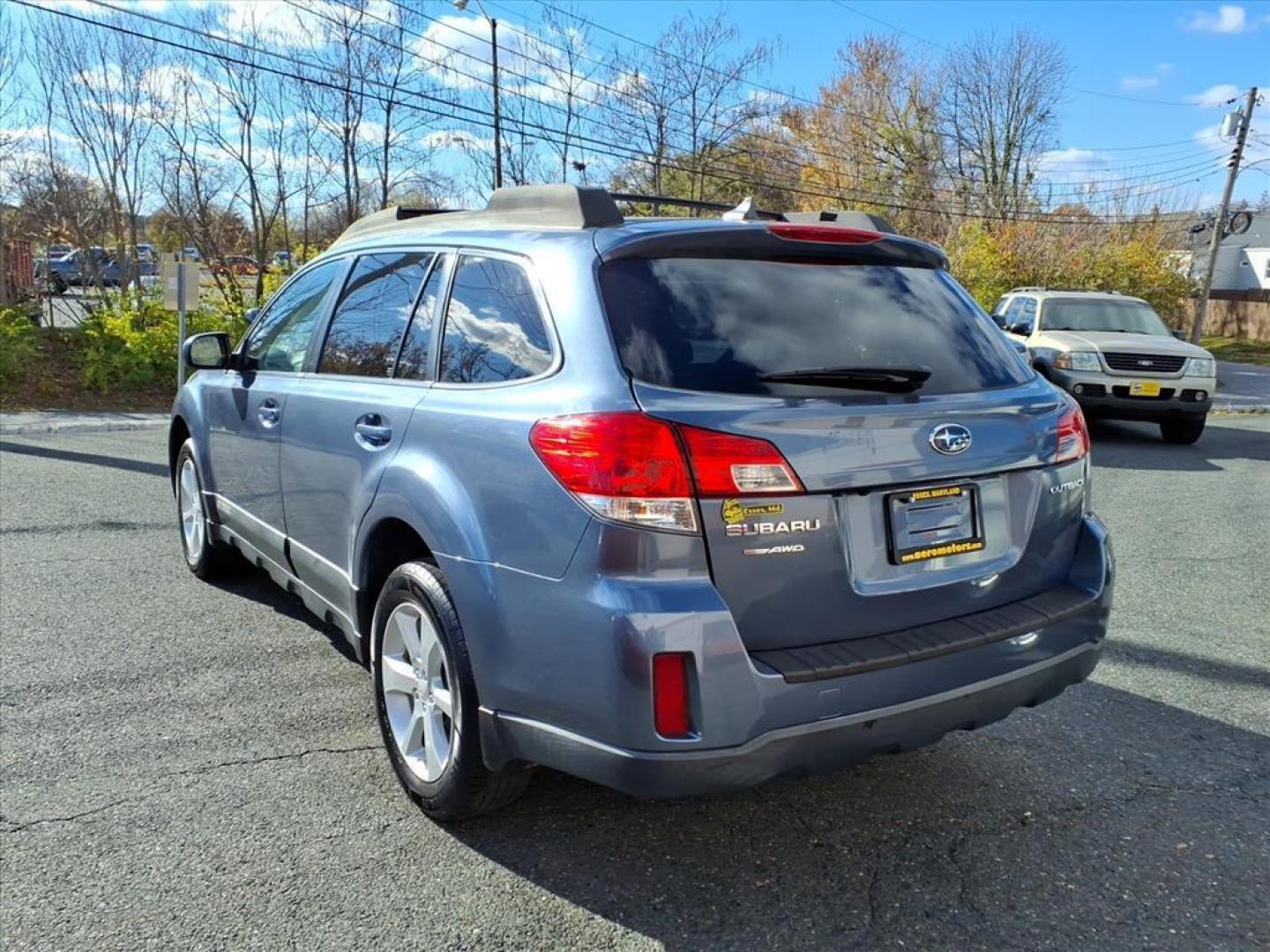 2014 Deep Indigo Pearl Subaru Outback 2.5i Premium (4S4BRCDC1E3) with an 2.5L 4 Cylinder Sequential-Port F.I. engine, 4CYL AWD transmission, located at 50 Eastern Blvd., Essex, MD, 21221, (410) 686-3444, 39.304367, -76.484947 - Photo#2