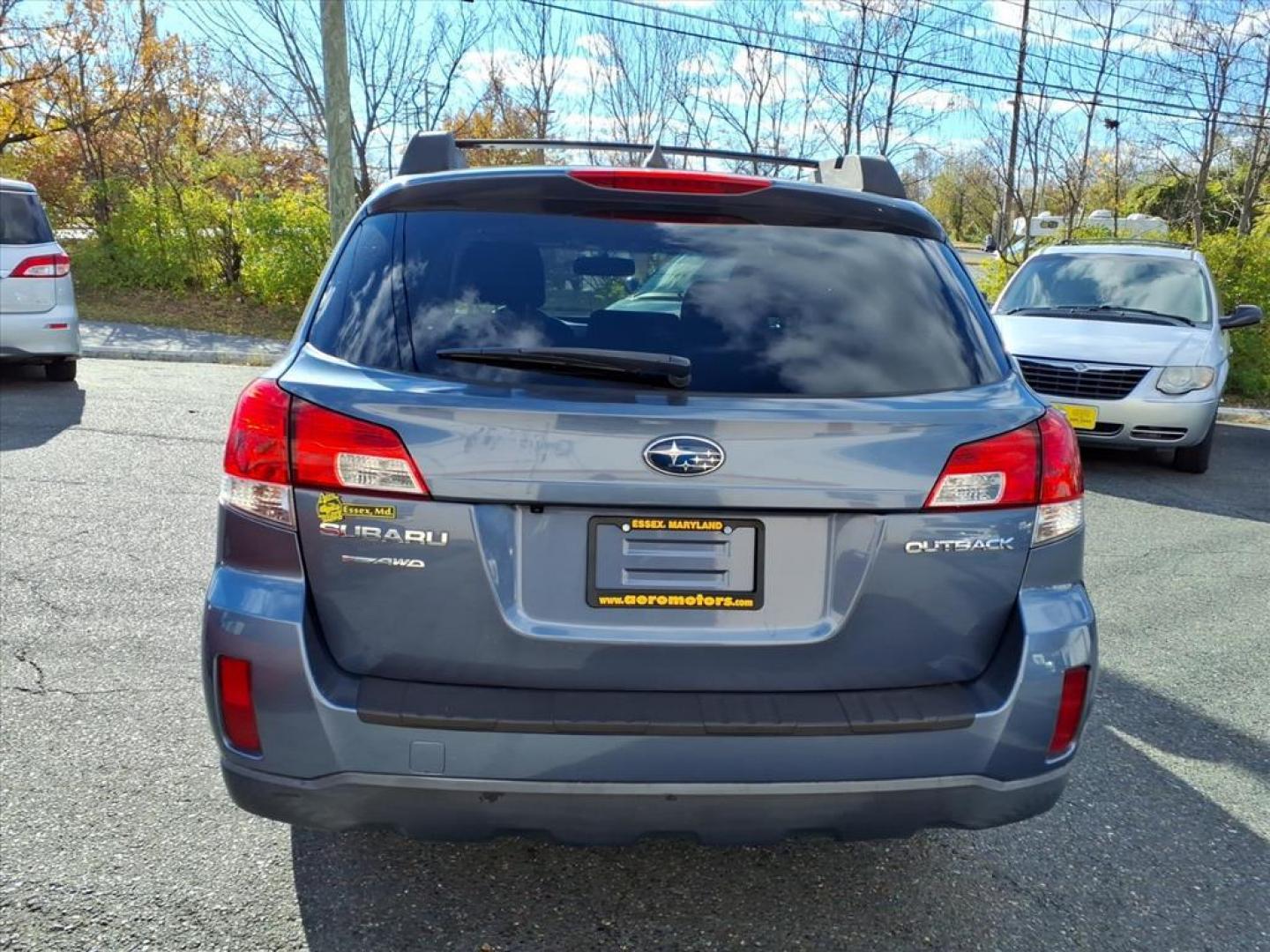 2014 Deep Indigo Pearl Subaru Outback 2.5i Premium (4S4BRCDC1E3) with an 2.5L 4 Cylinder Sequential-Port F.I. engine, 4CYL AWD transmission, located at 50 Eastern Blvd., Essex, MD, 21221, (410) 686-3444, 39.304367, -76.484947 - Photo#3