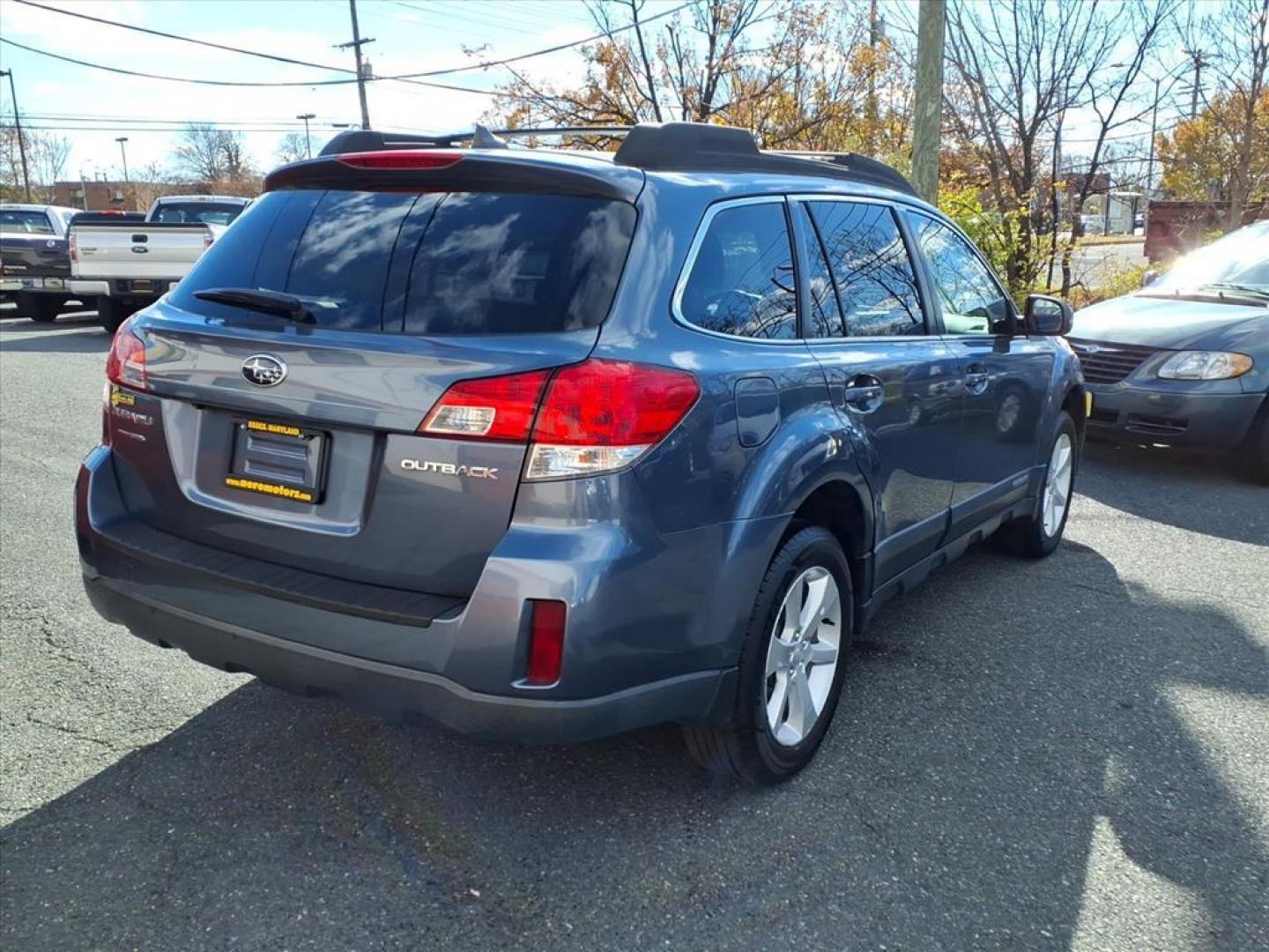 2014 Deep Indigo Pearl Subaru Outback 2.5i Premium (4S4BRCDC1E3) with an 2.5L 4 Cylinder Sequential-Port F.I. engine, 4CYL AWD transmission, located at 50 Eastern Blvd., Essex, MD, 21221, (410) 686-3444, 39.304367, -76.484947 - Photo#5