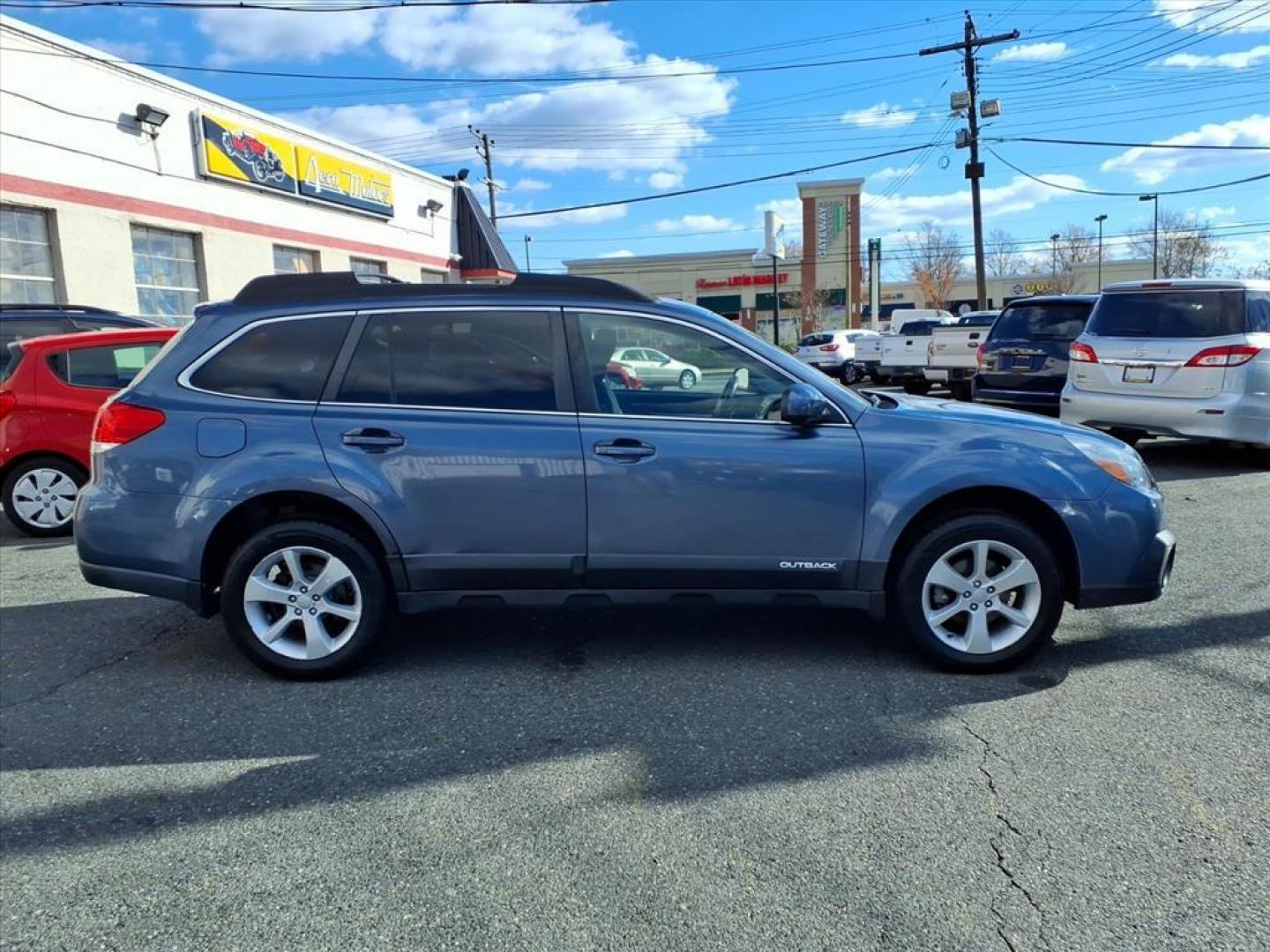 2014 Deep Indigo Pearl Subaru Outback 2.5i Premium (4S4BRCDC1E3) with an 2.5L 4 Cylinder Sequential-Port F.I. engine, 4CYL AWD transmission, located at 50 Eastern Blvd., Essex, MD, 21221, (410) 686-3444, 39.304367, -76.484947 - Photo#6