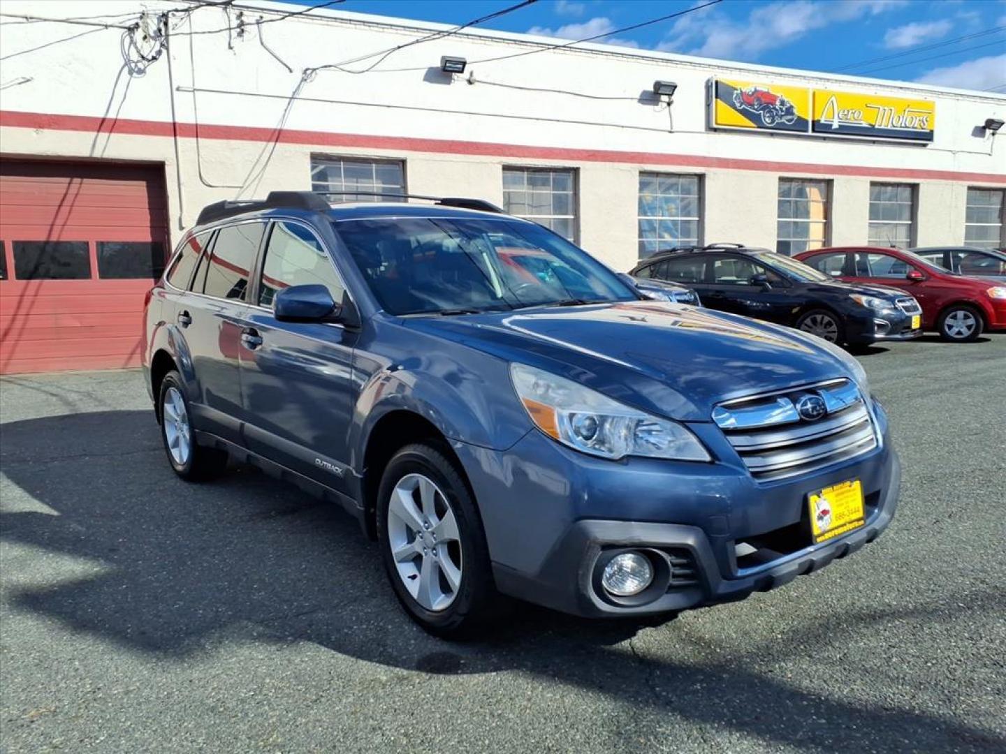 2014 Deep Indigo Pearl Subaru Outback 2.5i Premium (4S4BRCDC1E3) with an 2.5L 4 Cylinder Sequential-Port F.I. engine, 4CYL AWD transmission, located at 50 Eastern Blvd., Essex, MD, 21221, (410) 686-3444, 39.304367, -76.484947 - Photo#7