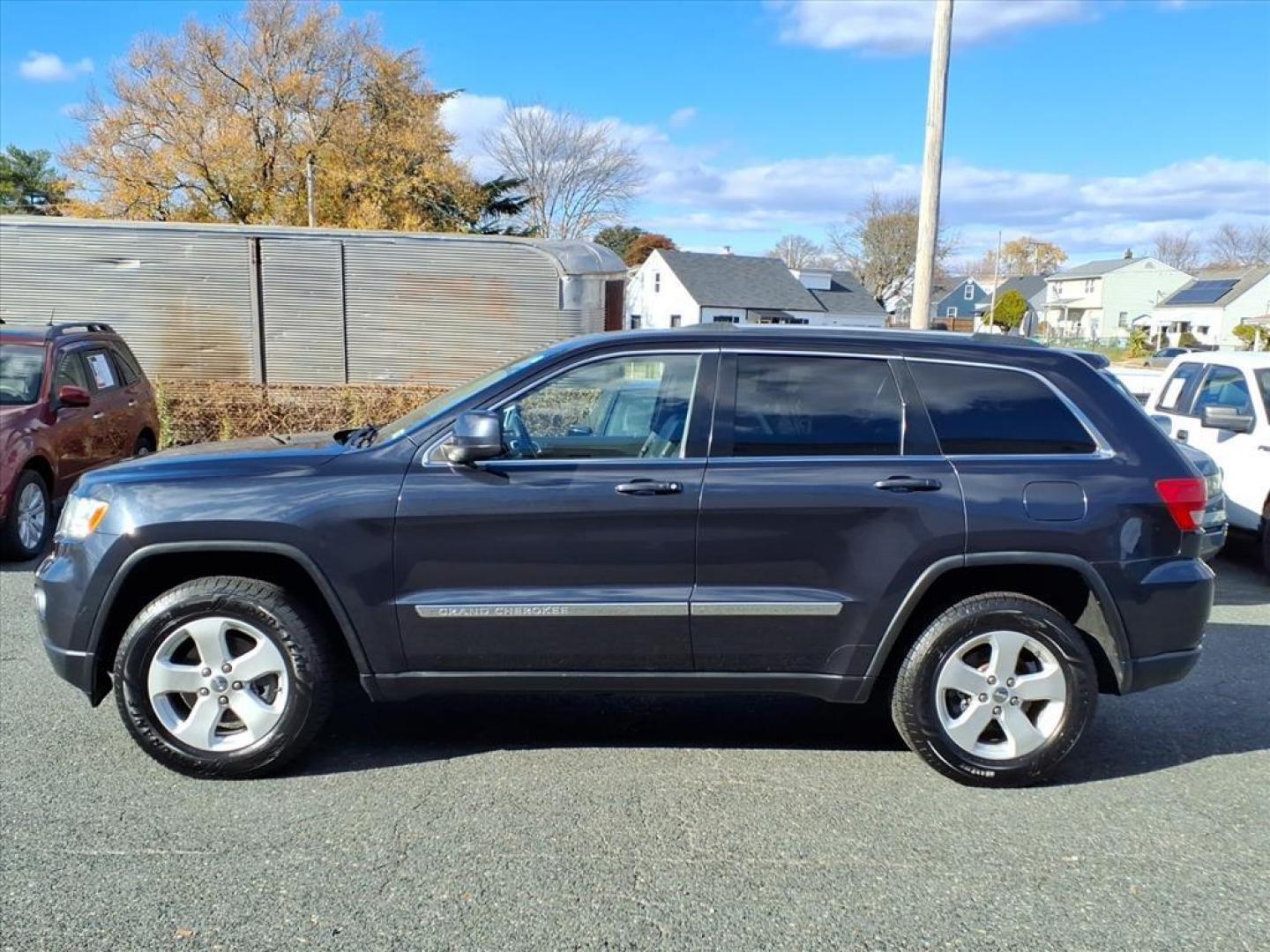 2012 Maximum Steel Metallic Clear Coat Jeep Grand Cherokee Laredo (1C4RJFAG5CC) with an 3.6L 3.6L V6 290hp 260ft. lbs. Sequential-Port F.I. engine, 5-Speed Automatic transmission, located at 50 Eastern Blvd., Essex, MD, 21221, (410) 686-3444, 39.304367, -76.484947 - Photo#1