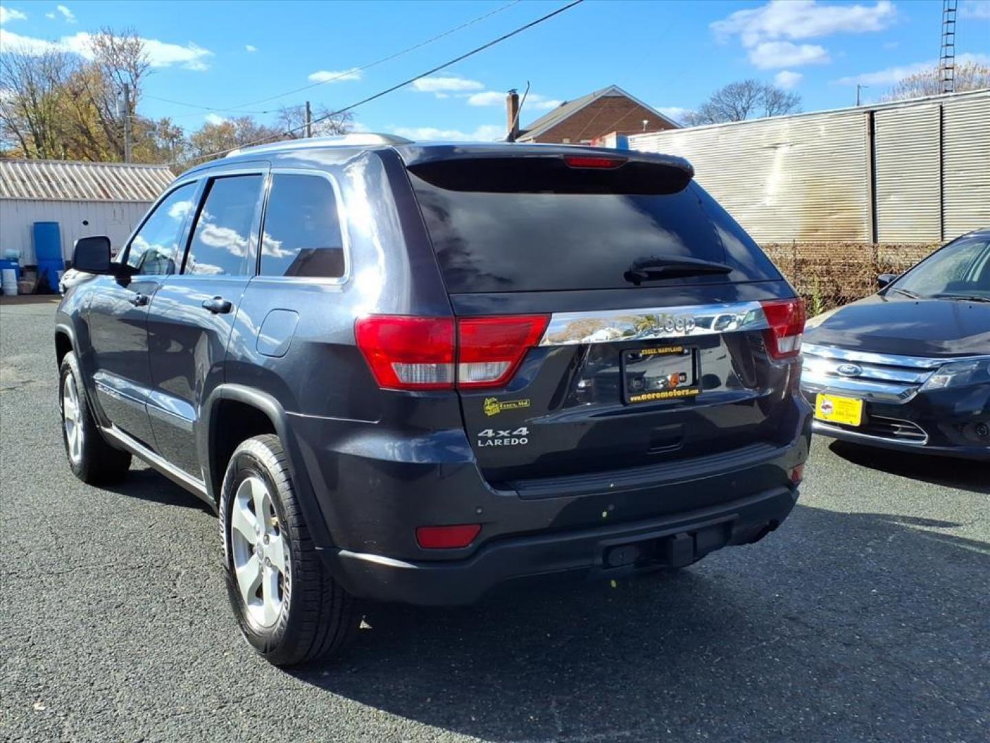 2012 Maximum Steel Metallic Clear Coat Jeep Grand Cherokee Laredo (1C4RJFAG5CC) with an 3.6L 3.6L V6 290hp 260ft. lbs. Sequential-Port F.I. engine, 5-Speed Automatic transmission, located at 50 Eastern Blvd., Essex, MD, 21221, (410) 686-3444, 39.304367, -76.484947 - Photo#2