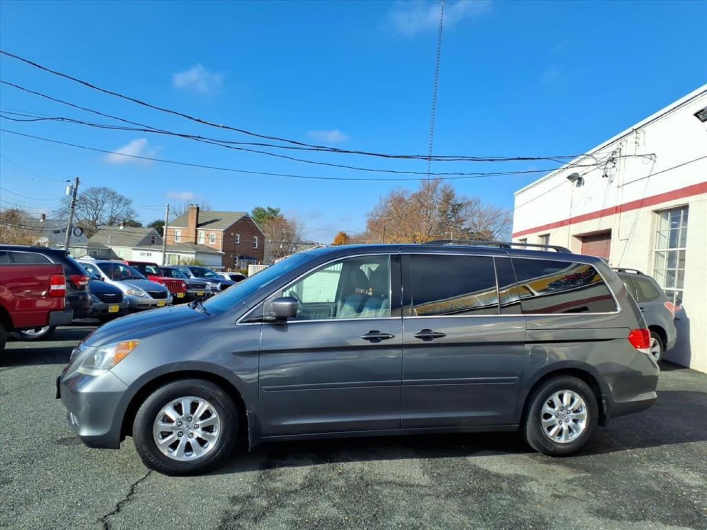 2010 Polished Metal Metallic Honda Odyssey EX-L (5FNRL3H6XAB) with an 3.5L 6 Cylinder Sequential-Port F.I. engine, ATV6 transmission, located at 50 Eastern Blvd., Essex, MD, 21221, (410) 686-3444, 39.304367, -76.484947 - Photo#1