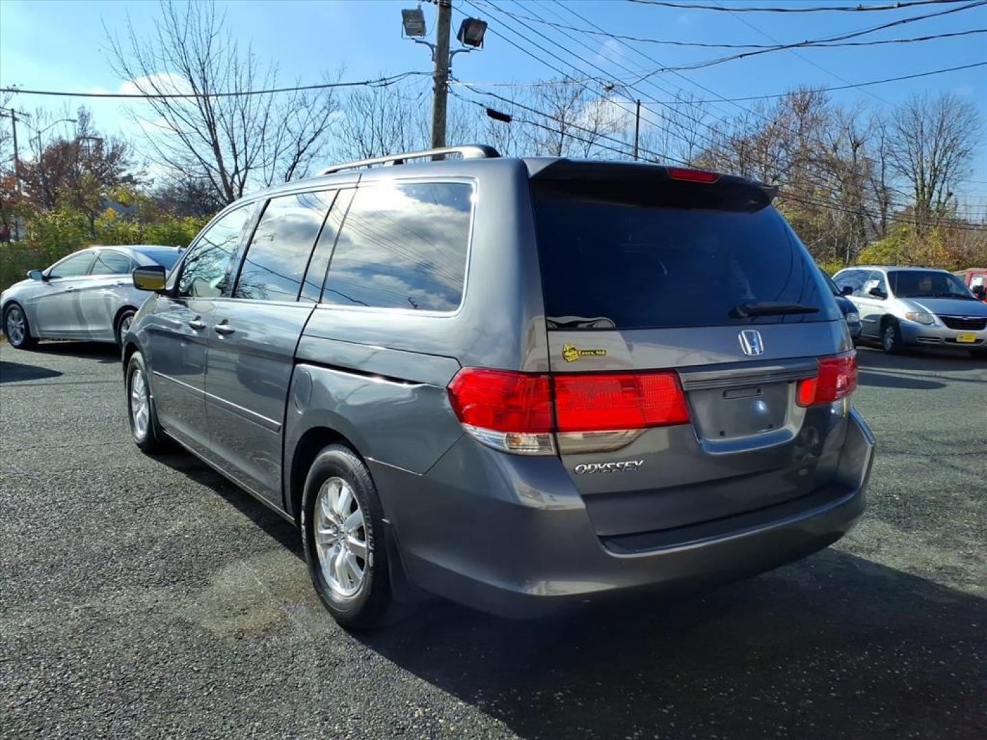 2010 Polished Metal Metallic Honda Odyssey EX-L (5FNRL3H6XAB) with an 3.5L 6 Cylinder Sequential-Port F.I. engine, ATV6 transmission, located at 50 Eastern Blvd., Essex, MD, 21221, (410) 686-3444, 39.304367, -76.484947 - Photo#2