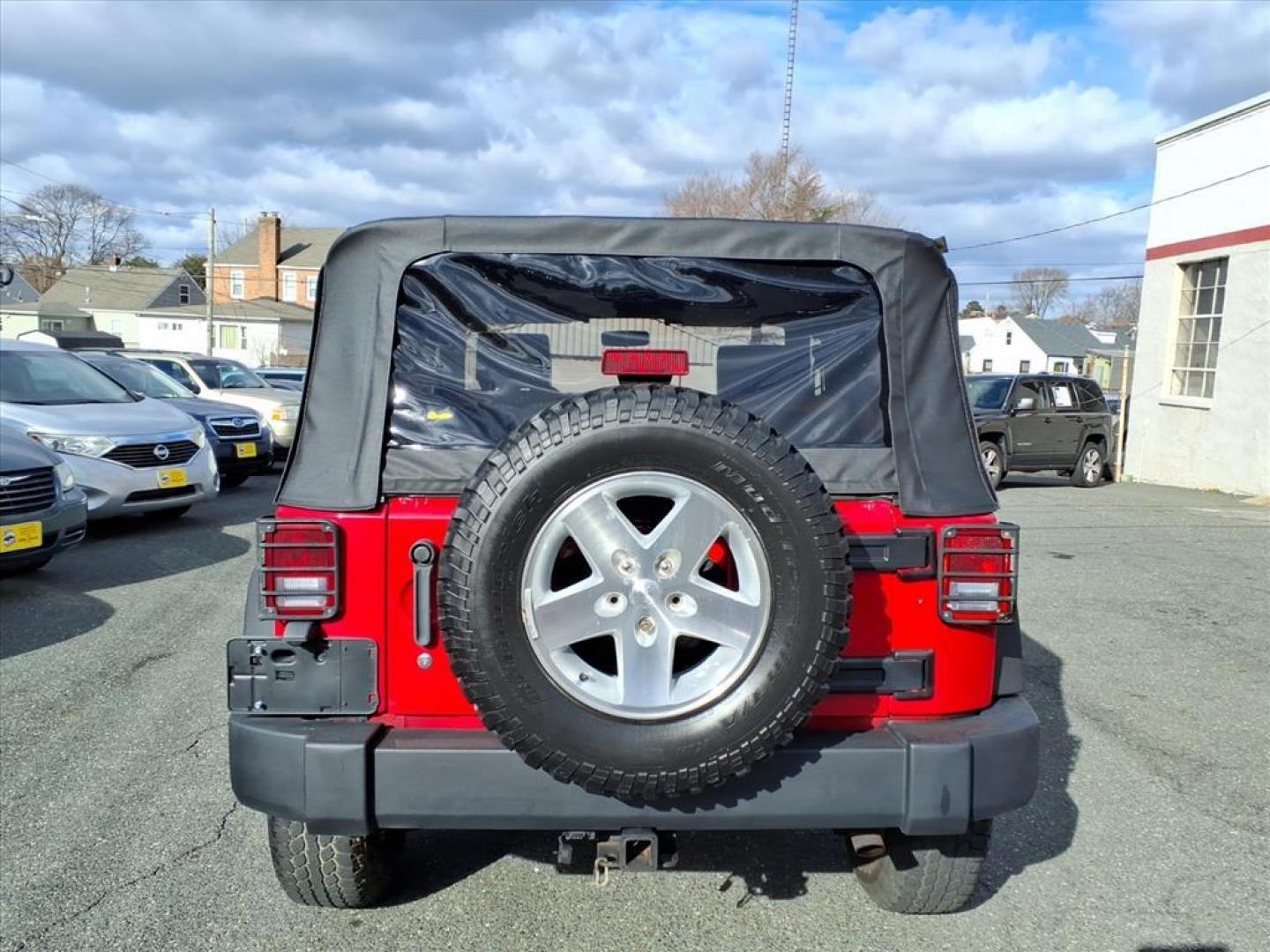 2007 Flame Red Clearcoat Jeep Wrangler Rubicon (1J4GA64187L) with an 3.8L 6 Cylinder Sequential-Port F.I. engine, V6 AT 4X4 transmission, located at 50 Eastern Blvd., Essex, MD, 21221, (410) 686-3444, 39.304367, -76.484947 - Photo#3