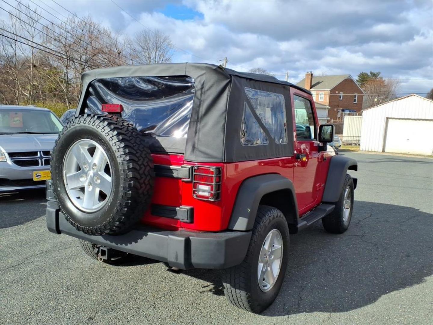 2007 Flame Red Clearcoat Jeep Wrangler Rubicon (1J4GA64187L) with an 3.8L 6 Cylinder Sequential-Port F.I. engine, V6 AT 4X4 transmission, located at 50 Eastern Blvd., Essex, MD, 21221, (410) 686-3444, 39.304367, -76.484947 - Photo#4