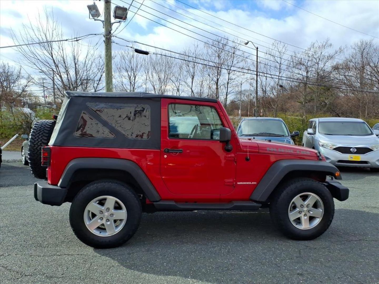 2007 Flame Red Clearcoat Jeep Wrangler Rubicon (1J4GA64187L) with an 3.8L 6 Cylinder Sequential-Port F.I. engine, V6 AT 4X4 transmission, located at 50 Eastern Blvd., Essex, MD, 21221, (410) 686-3444, 39.304367, -76.484947 - Photo#5