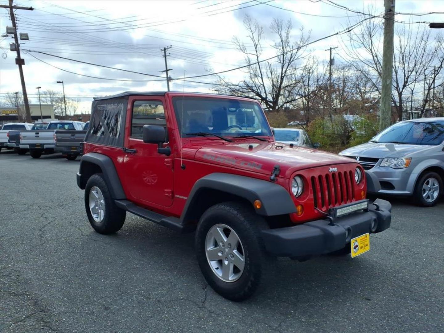 2007 Flame Red Clearcoat Jeep Wrangler Rubicon (1J4GA64187L) with an 3.8L 6 Cylinder Sequential-Port F.I. engine, V6 AT 4X4 transmission, located at 50 Eastern Blvd., Essex, MD, 21221, (410) 686-3444, 39.304367, -76.484947 - Photo#6