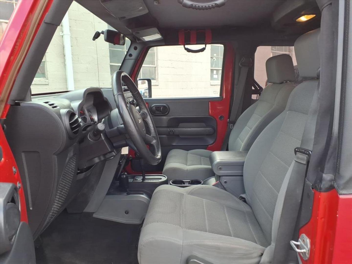 2007 Flame Red Clearcoat Jeep Wrangler Rubicon (1J4GA64187L) with an 3.8L 6 Cylinder Sequential-Port F.I. engine, V6 AT 4X4 transmission, located at 50 Eastern Blvd., Essex, MD, 21221, (410) 686-3444, 39.304367, -76.484947 - Photo#11