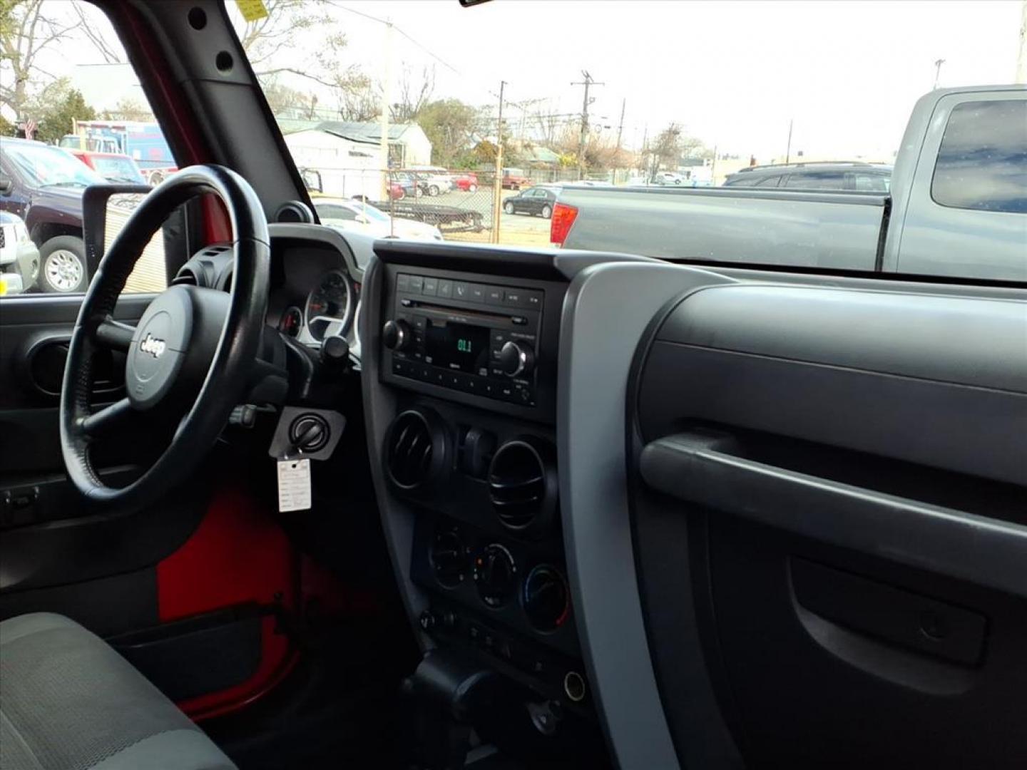 2007 Flame Red Clearcoat Jeep Wrangler Rubicon (1J4GA64187L) with an 3.8L 6 Cylinder Sequential-Port F.I. engine, V6 AT 4X4 transmission, located at 50 Eastern Blvd., Essex, MD, 21221, (410) 686-3444, 39.304367, -76.484947 - Photo#14
