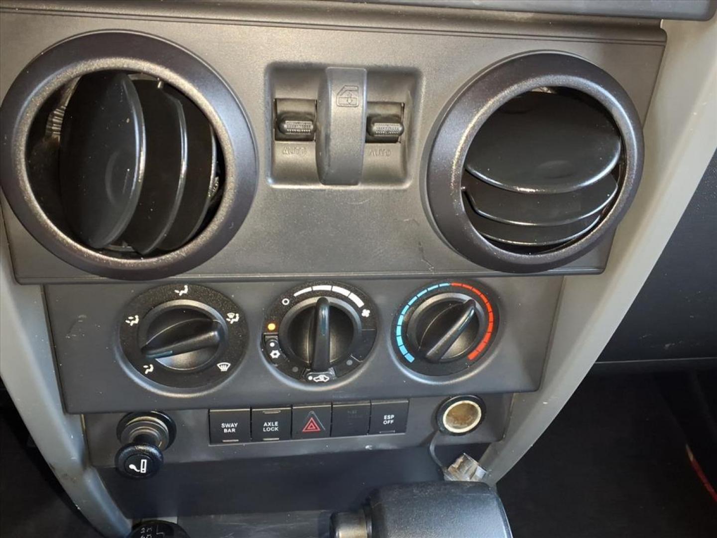 2007 Flame Red Clearcoat Jeep Wrangler Rubicon (1J4GA64187L) with an 3.8L 6 Cylinder Sequential-Port F.I. engine, V6 AT 4X4 transmission, located at 50 Eastern Blvd., Essex, MD, 21221, (410) 686-3444, 39.304367, -76.484947 - Photo#15