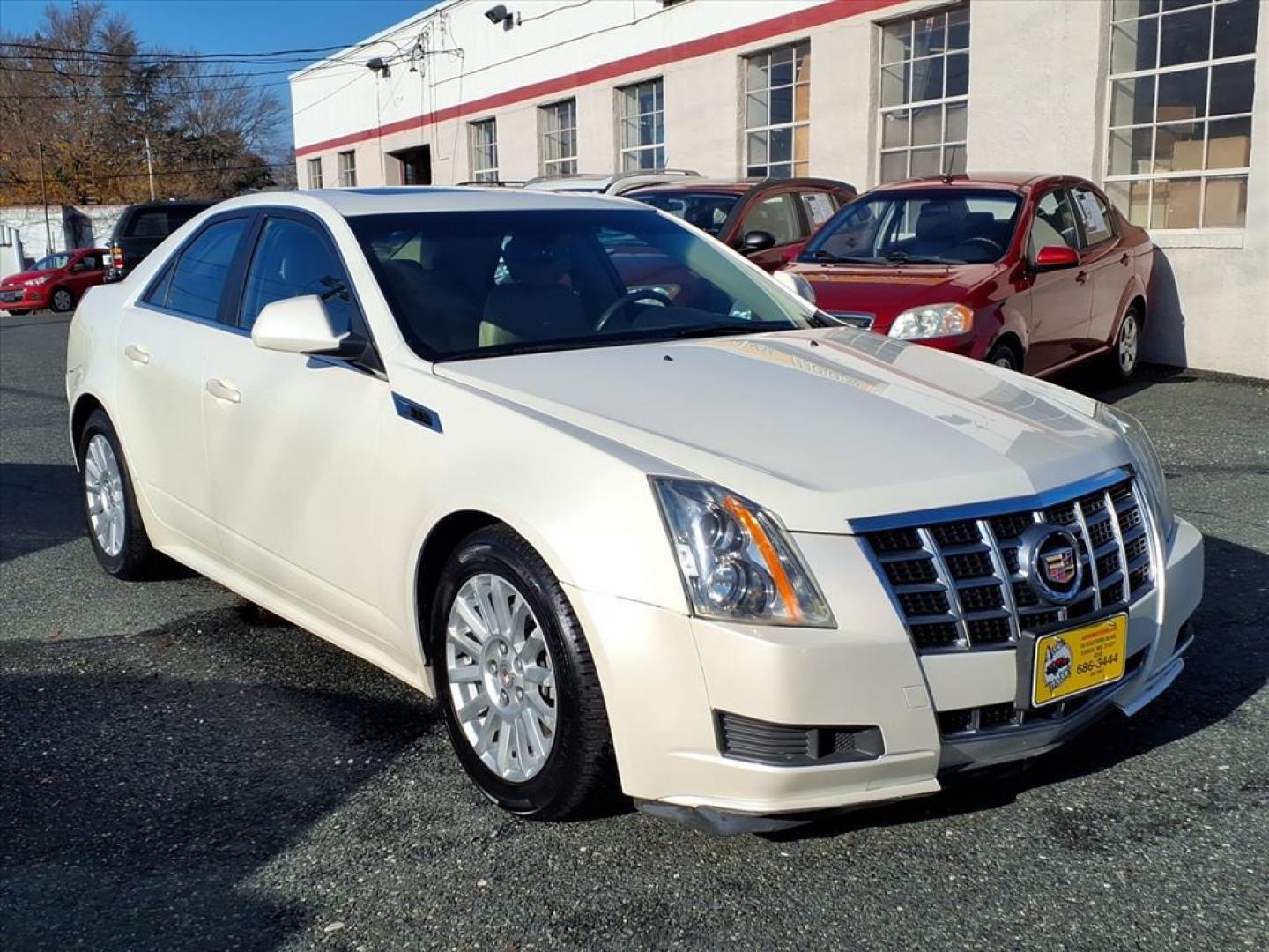 2013 White Diamond Tricoat Cadillac CTS 3.0L Luxury (1G6DH5E57D0) with an 3.0L 6 Cylinder Fuel Injected engine, V6AWD transmission, located at 50 Eastern Blvd., Essex, MD, 21221, (410) 686-3444, 39.304367, -76.484947 - Photo#5