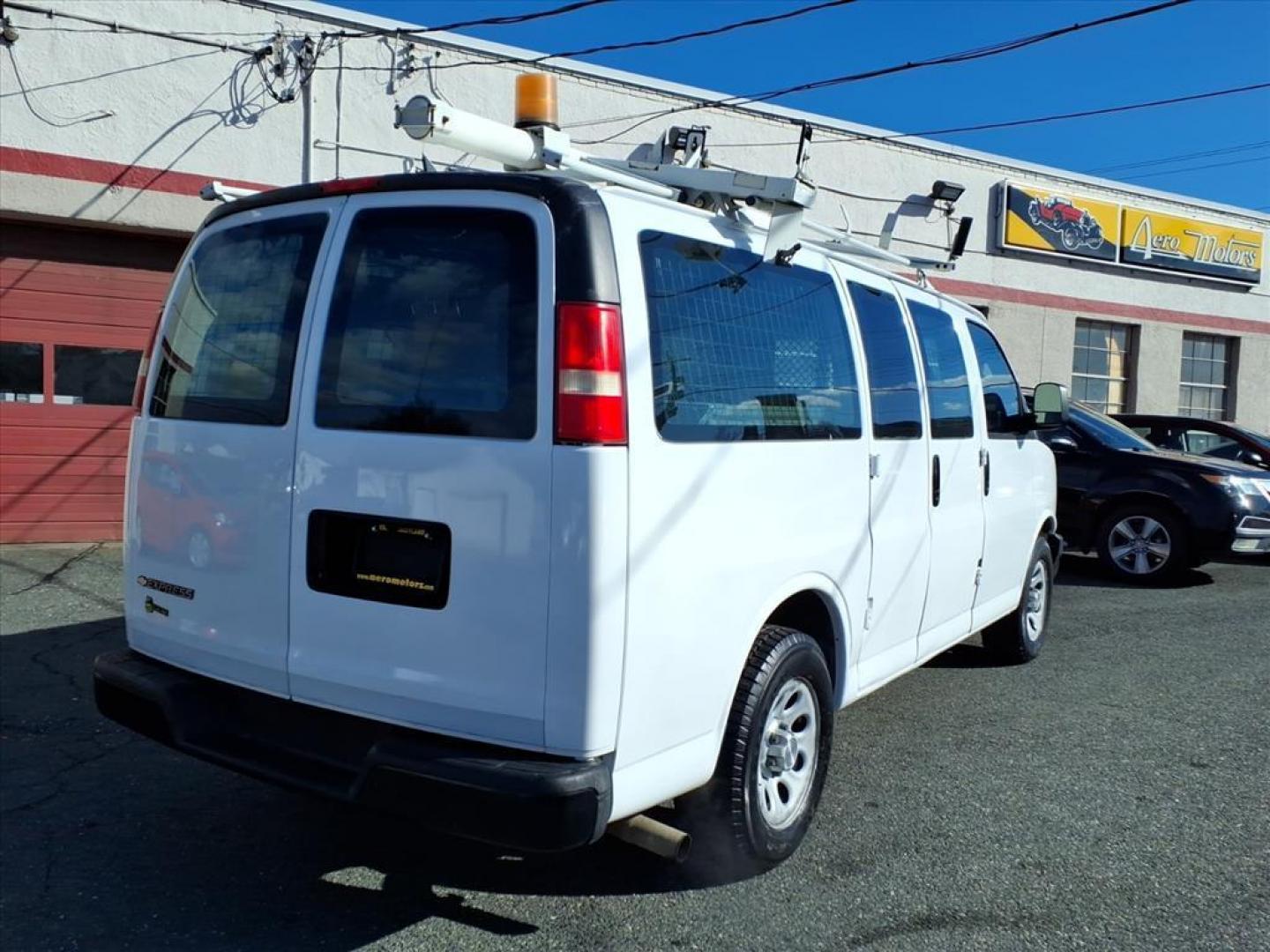 2009 Summit White Chevrolet Express 1500 (1GCFG15X191) with an 4.3L 6 Cylinder Fuel Injected engine, V8 transmission, located at 50 Eastern Blvd., Essex, MD, 21221, (410) 686-3444, 39.304367, -76.484947 - Photo#5