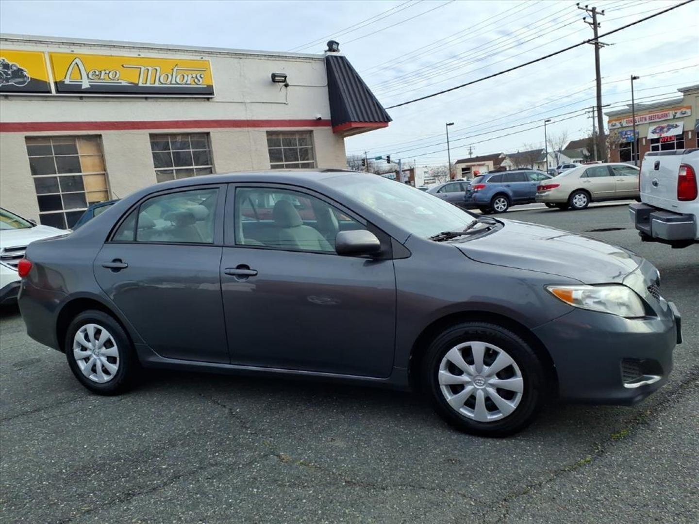 2010 Magnetic Gray Metallic Toyota Corolla LE (2T1BU4EE9AC) with an 1.8L 1.8L I4 132hp 128ft. lbs. Sequential-Port F.I. engine, 4-Speed Automatic transmission, located at 50 Eastern Blvd., Essex, MD, 21221, (410) 686-3444, 39.304367, -76.484947 - Photo#3