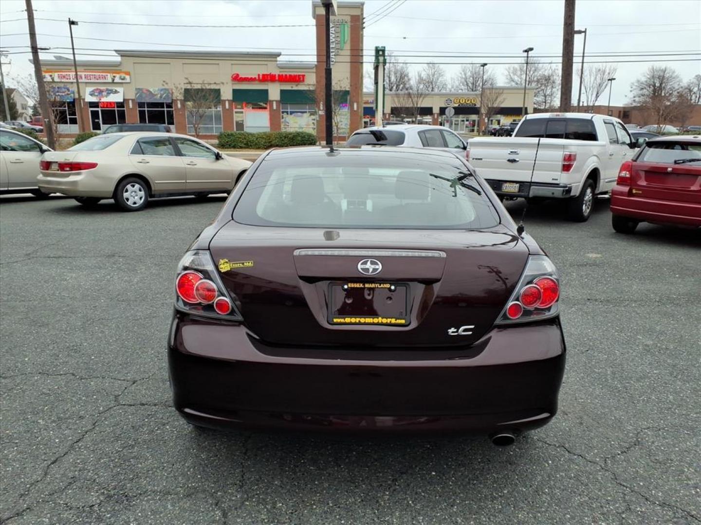 2009 Sizzling Crimson Mica Scion tC Base (JTKDE167390) with an 2.4L 2.4L I4 161hp 162ft. lbs. Fuel Injected engine, 4-Speed Automatic transmission, located at 50 Eastern Blvd., Essex, MD, 21221, (410) 686-3444, 39.304367, -76.484947 - Photo#3