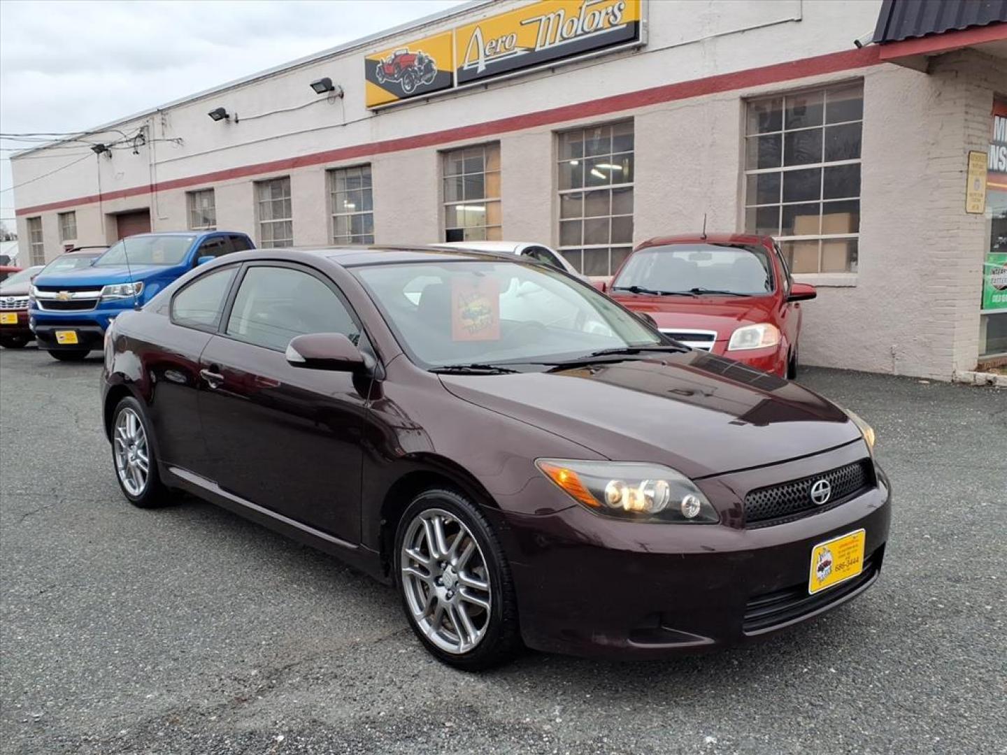 2009 Sizzling Crimson Mica Scion tC Base (JTKDE167390) with an 2.4L 2.4L I4 161hp 162ft. lbs. Fuel Injected engine, 4-Speed Automatic transmission, located at 50 Eastern Blvd., Essex, MD, 21221, (410) 686-3444, 39.304367, -76.484947 - Photo#6