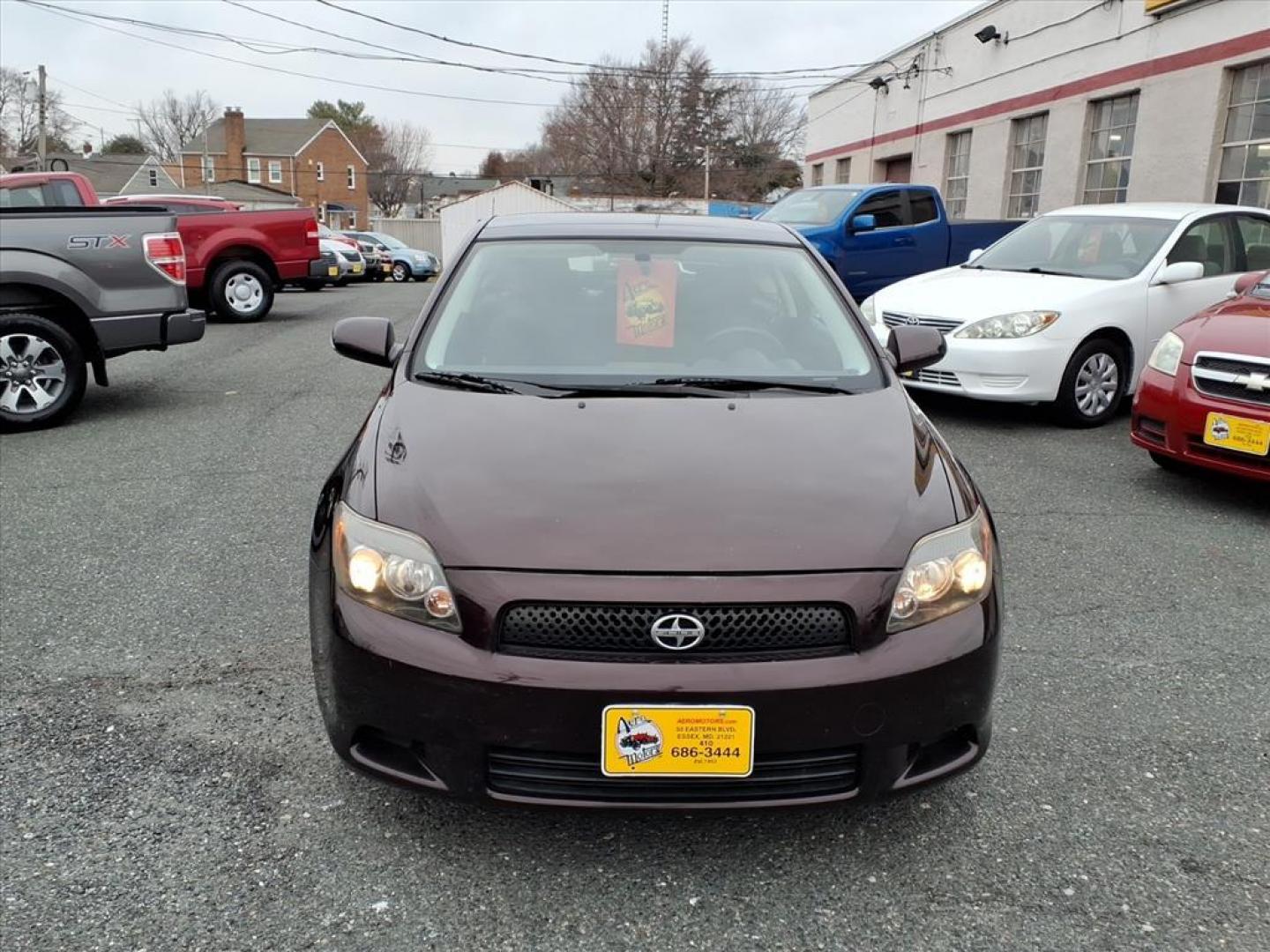 2009 Sizzling Crimson Mica Scion tC Base (JTKDE167390) with an 2.4L 2.4L I4 161hp 162ft. lbs. Fuel Injected engine, 4-Speed Automatic transmission, located at 50 Eastern Blvd., Essex, MD, 21221, (410) 686-3444, 39.304367, -76.484947 - Photo#7