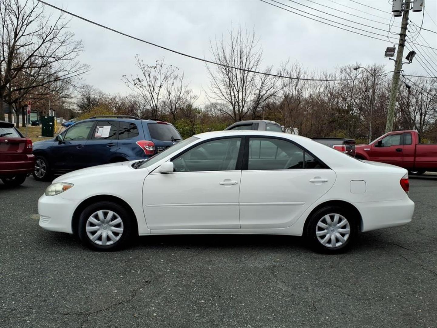 2006 Super White Toyota Camry LE (4T1BE32K36U) with an 2.4L 2L NA I4 double overhead cam (DOHC) 16V Fuel Injected engine, 5-Speed Automatic transmission, located at 50 Eastern Blvd., Essex, MD, 21221, (410) 686-3444, 39.304367, -76.484947 - Photo#1