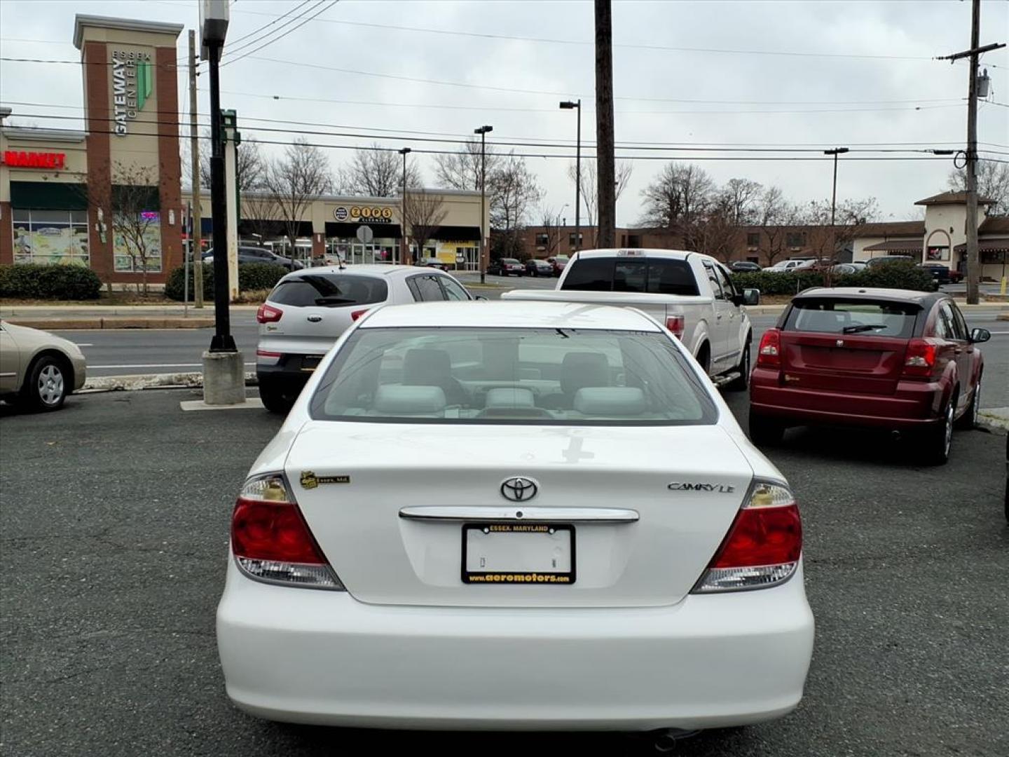 2006 Super White Toyota Camry LE (4T1BE32K36U) with an 2.4L 2L NA I4 double overhead cam (DOHC) 16V Fuel Injected engine, 5-Speed Automatic transmission, located at 50 Eastern Blvd., Essex, MD, 21221, (410) 686-3444, 39.304367, -76.484947 - Photo#3