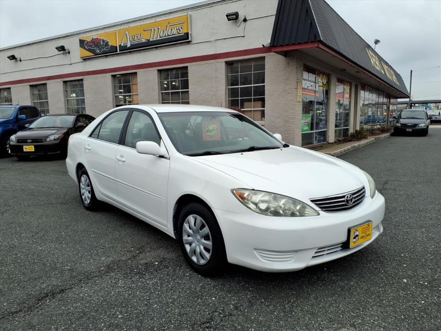 2006 Super White Toyota Camry LE (4T1BE32K36U) with an 2.4L 2L NA I4 double overhead cam (DOHC) 16V Fuel Injected engine, 5-Speed Automatic transmission, located at 50 Eastern Blvd., Essex, MD, 21221, (410) 686-3444, 39.304367, -76.484947 - Photo#6