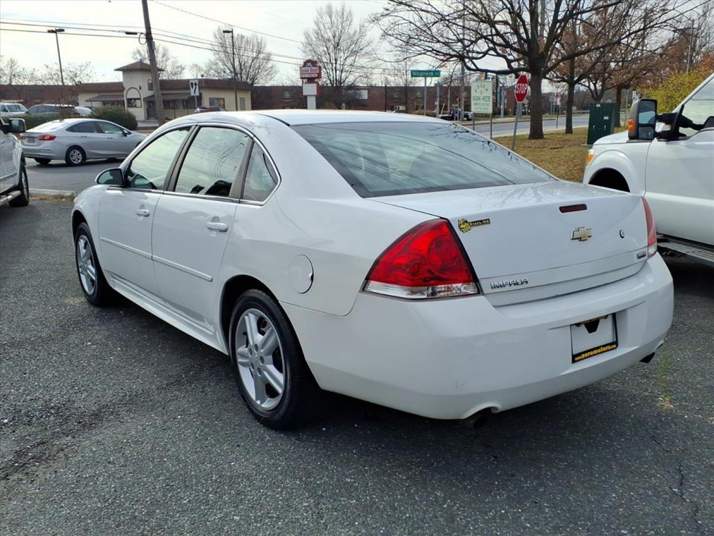 2013 Summit White Chevrolet Impala Unmarked Police (2G1WD5E30D1) with an 3.6L 3.6L Flex Fuel V6 302hp 262ft. lbs. Fuel Injected engine, 6-Speed Automatic w/Overdrive transmission, located at 50 Eastern Blvd., Essex, MD, 21221, (410) 686-3444, 39.304367, -76.484947 - Photo#2
