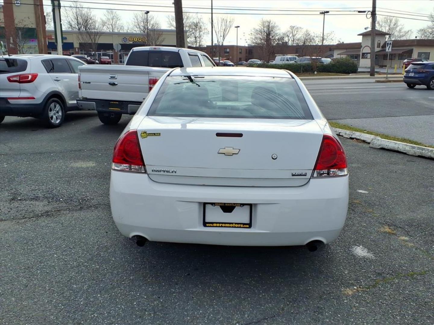 2013 Summit White Chevrolet Impala Unmarked Police (2G1WD5E30D1) with an 3.6L 3.6L Flex Fuel V6 302hp 262ft. lbs. Fuel Injected engine, 6-Speed Automatic w/Overdrive transmission, located at 50 Eastern Blvd., Essex, MD, 21221, (410) 686-3444, 39.304367, -76.484947 - Photo#3