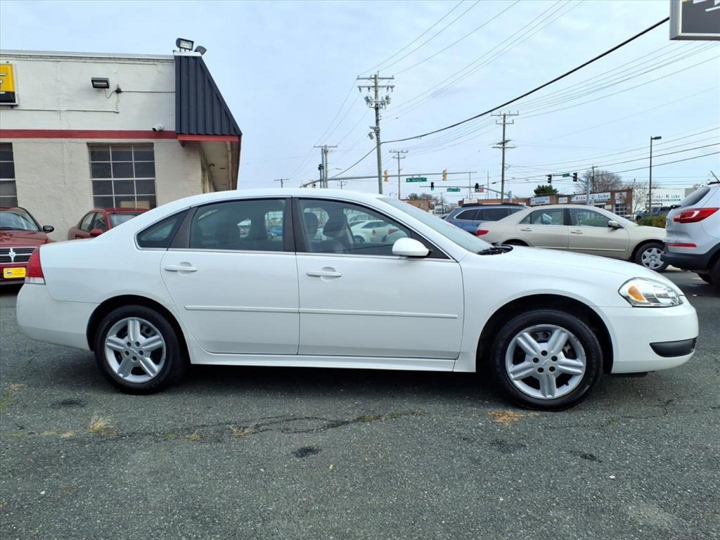 2013 Summit White Chevrolet Impala Unmarked Police (2G1WD5E30D1) with an 3.6L 3.6L Flex Fuel V6 302hp 262ft. lbs. Fuel Injected engine, 6-Speed Automatic w/Overdrive transmission, located at 50 Eastern Blvd., Essex, MD, 21221, (410) 686-3444, 39.304367, -76.484947 - Photo#4