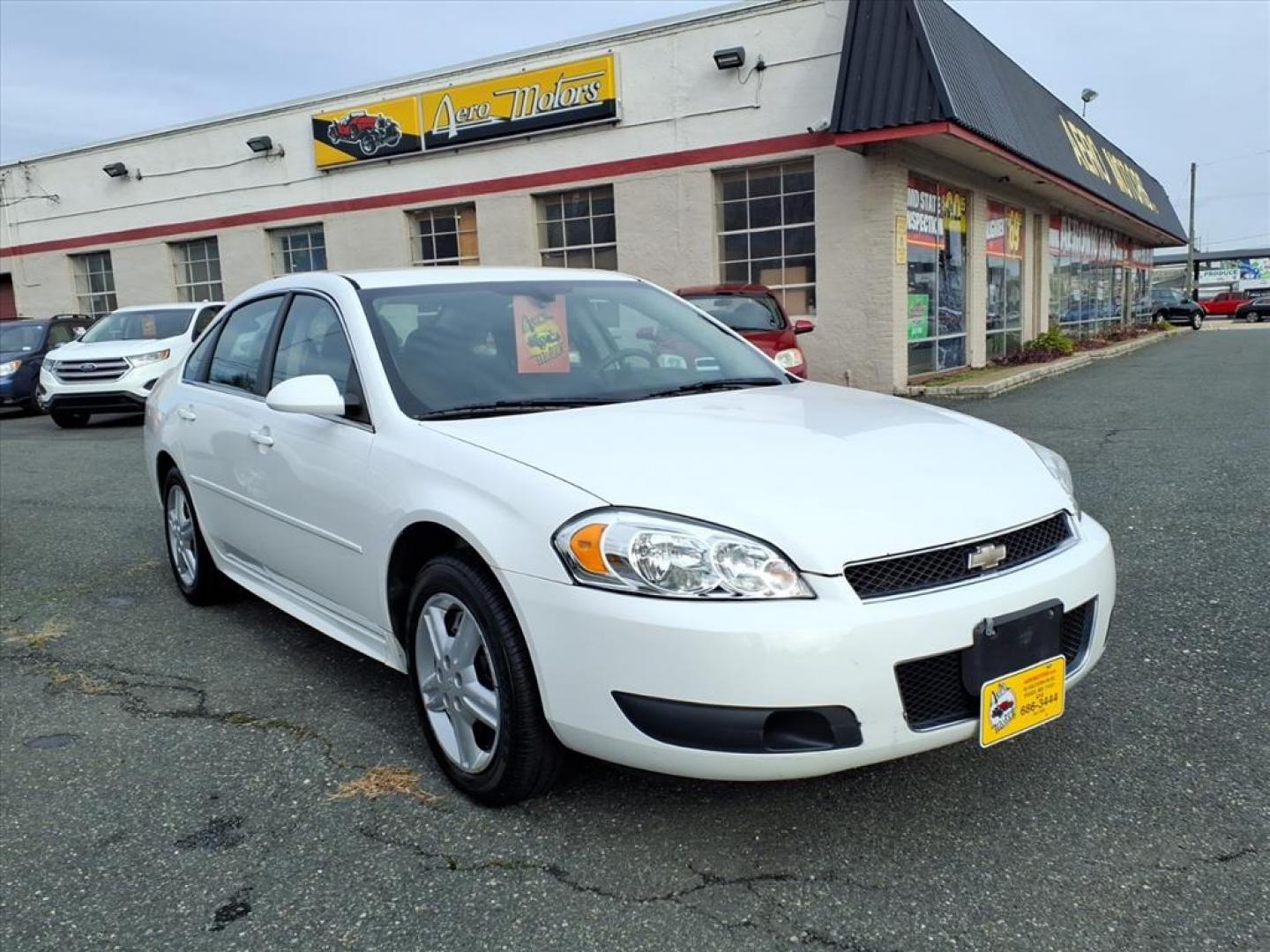 2013 Summit White Chevrolet Impala Unmarked Police (2G1WD5E30D1) with an 3.6L 3.6L Flex Fuel V6 302hp 262ft. lbs. Fuel Injected engine, 6-Speed Automatic w/Overdrive transmission, located at 50 Eastern Blvd., Essex, MD, 21221, (410) 686-3444, 39.304367, -76.484947 - Photo#5