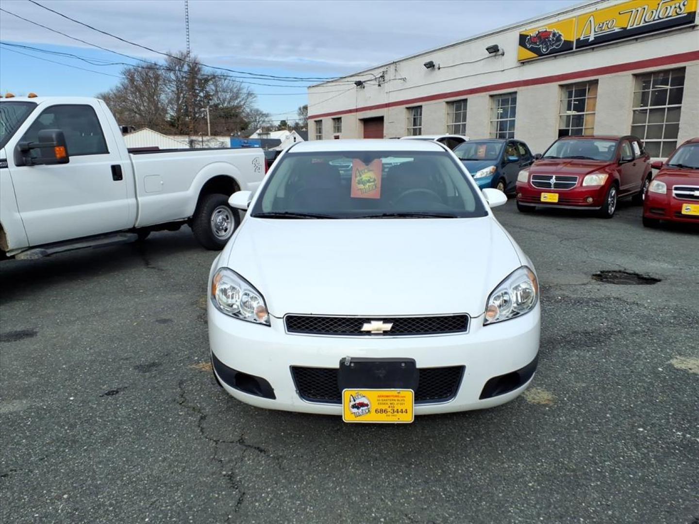 2013 Summit White Chevrolet Impala Unmarked Police (2G1WD5E30D1) with an 3.6L 3.6L Flex Fuel V6 302hp 262ft. lbs. Fuel Injected engine, 6-Speed Automatic w/Overdrive transmission, located at 50 Eastern Blvd., Essex, MD, 21221, (410) 686-3444, 39.304367, -76.484947 - Photo#6