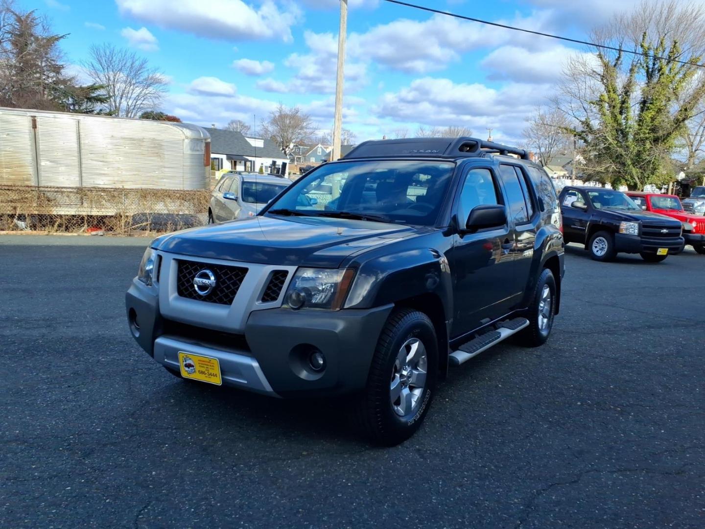 2010 Night Armor Nissan Xterra S (5N1AN0NU9AC) with an 4.0L 4.0L V6 261hp 281ft. lbs. Fuel Injected engine, 5-Speed Automatic transmission, located at 50 Eastern Blvd., Essex, MD, 21221, (410) 686-3444, 39.304367, -76.484947 - Photo#0